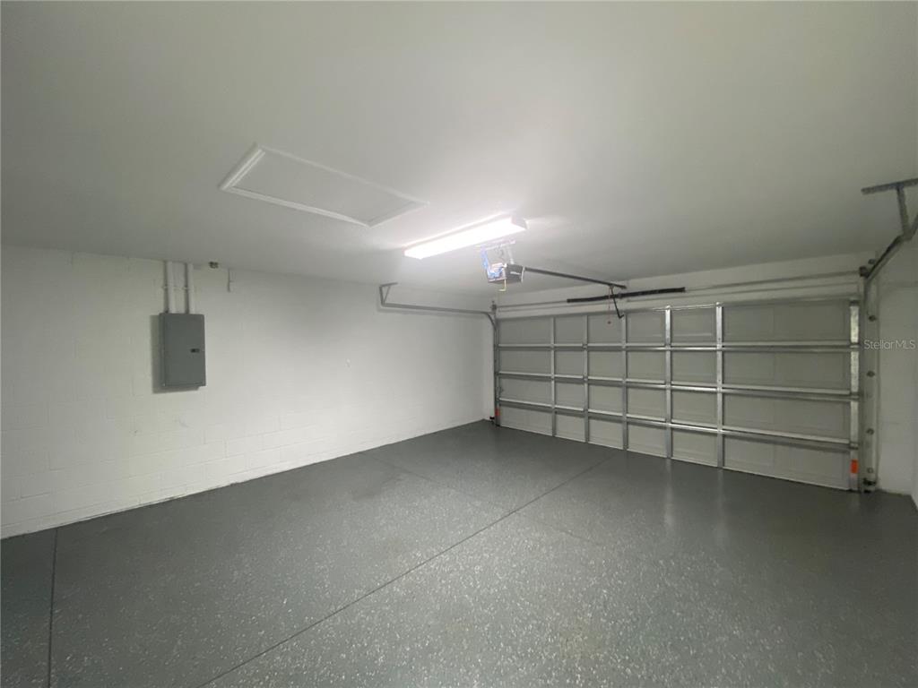 3200 Southwest 129th Loop Ocala, FL 34473 - Photo 26 of 29 an empty room with a empty space and empty shelves