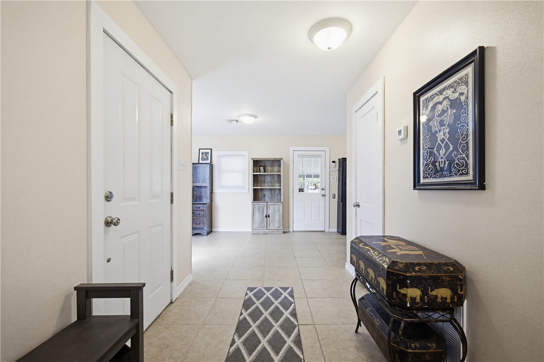 234 East Trant Road Kingsville, TX 78363 - Photo 6 of 32 a bedroom with furniture and a window