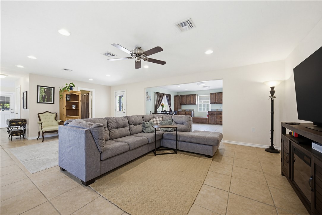 234 East Trant Road Kingsville, TX 78363 - Photo 8 of 32 a living room with furniture and a flat screen tv