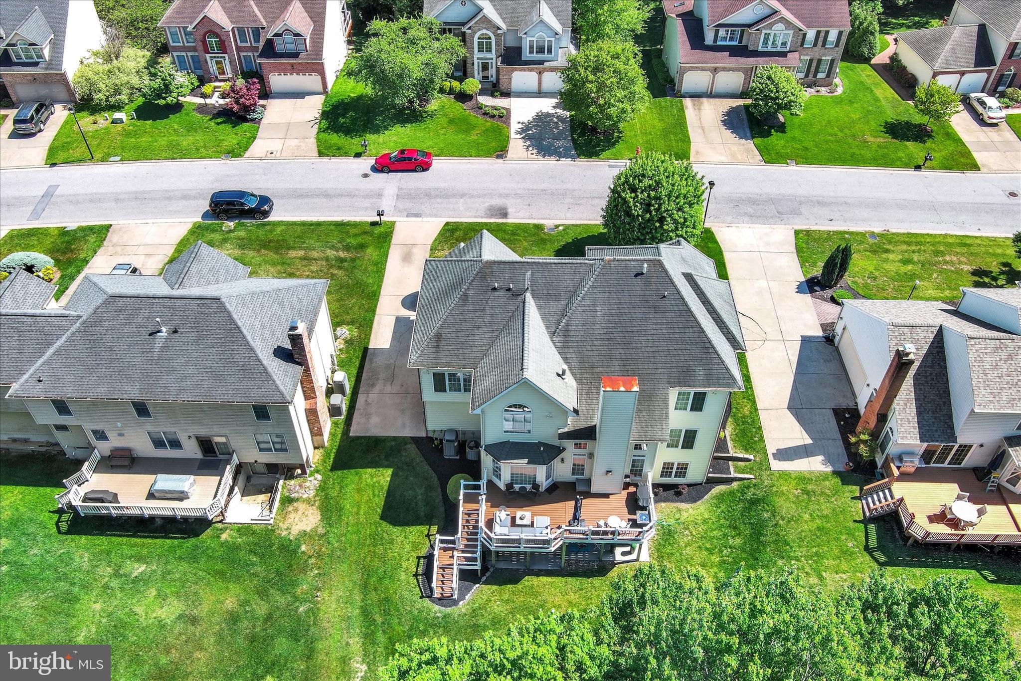 9318 Ravenridge Road Baltimore, MD 21234 - Photo 4 of 9 an aerial view of a house with garden space and street view