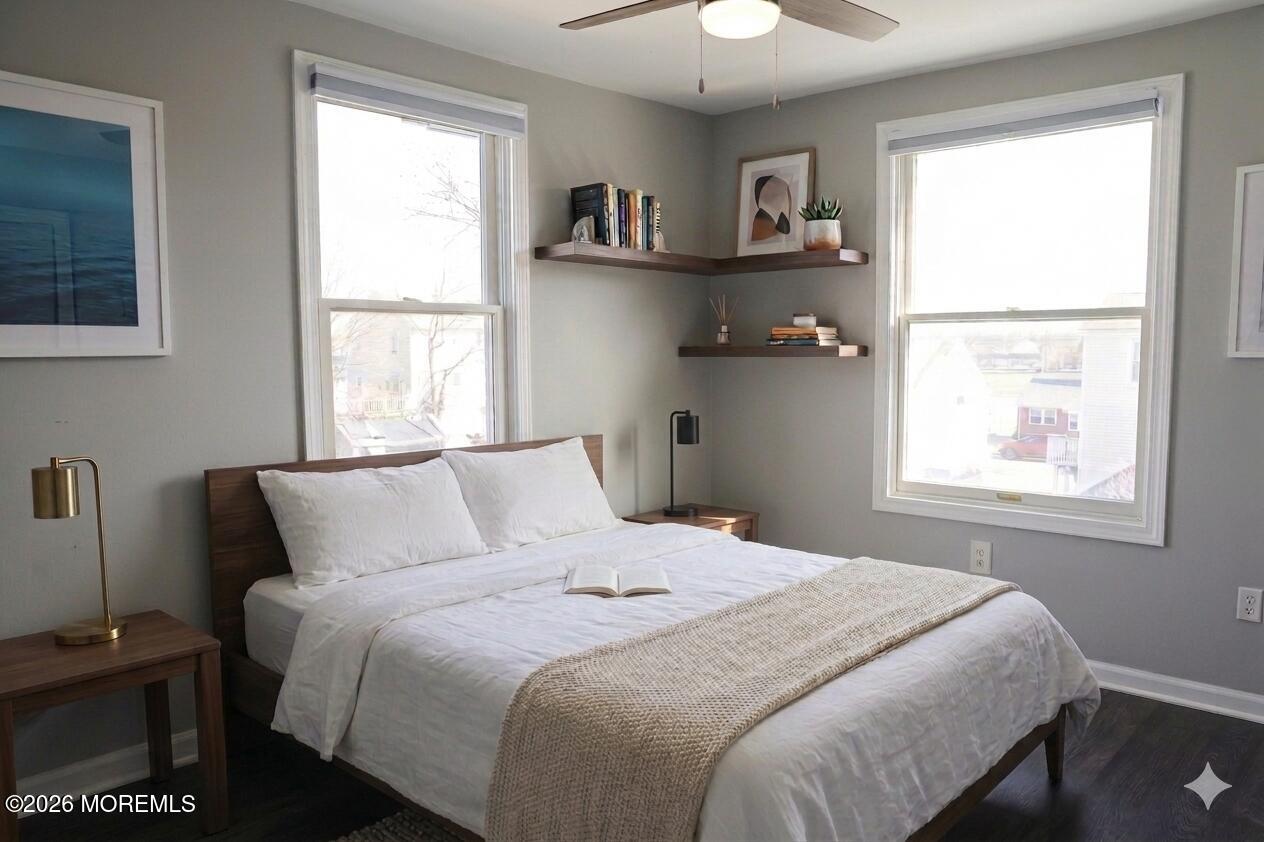 320 Lorillard Avenue Union Beach, NJ 07735 - Photo 13 of 24 a bedroom with a bed and a window