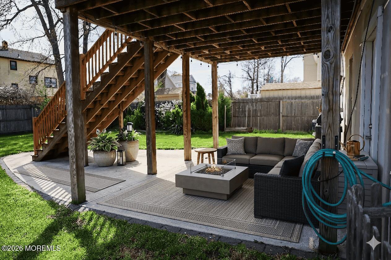 320 Lorillard Avenue Union Beach, NJ 07735 - Photo 21 of 24 a backyard of a house with table and chairs