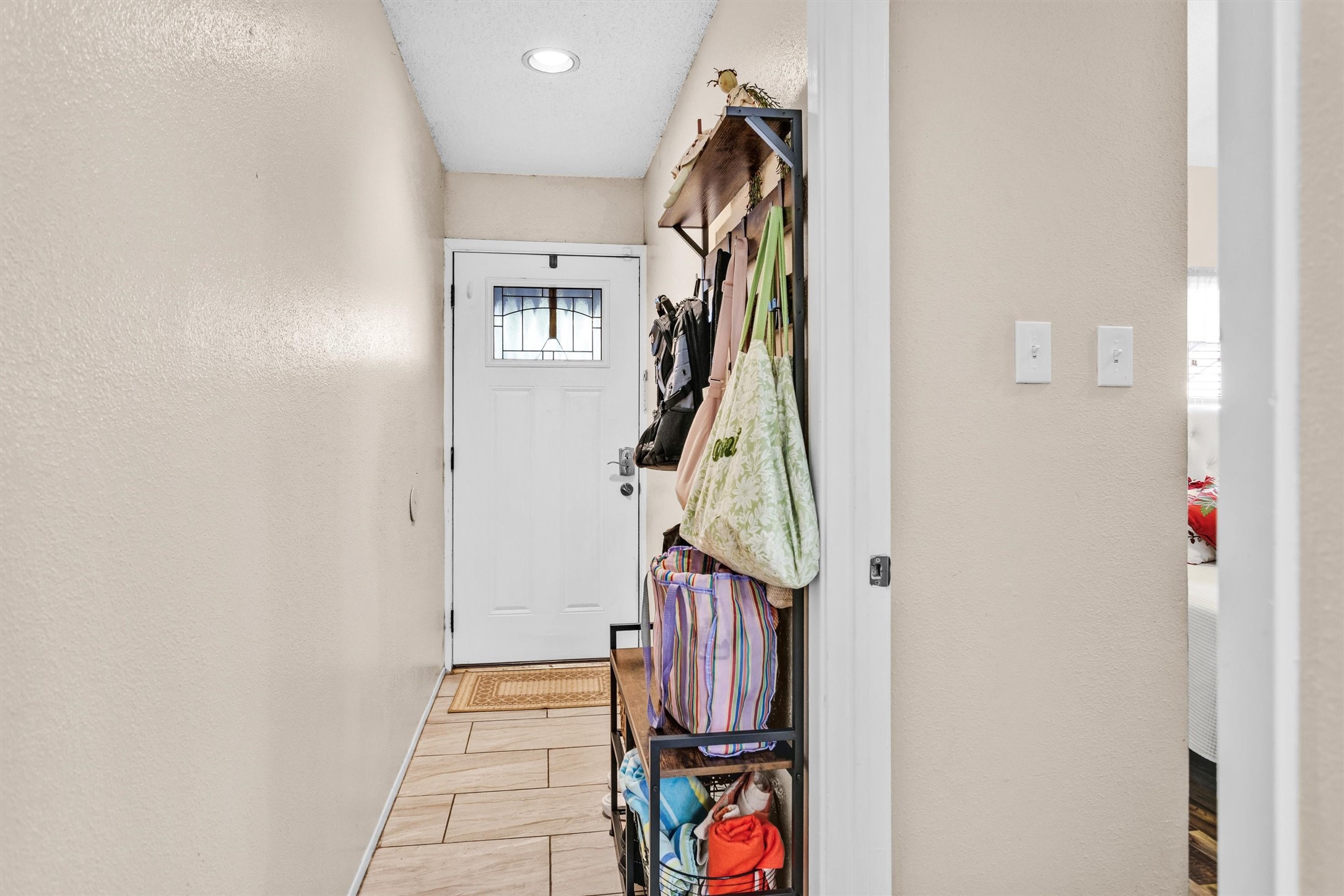 12900 Walden Road, Unit 814H Montgomery, TX 77356 - Photo 7 of 39 Looking from the kitchen to the front door