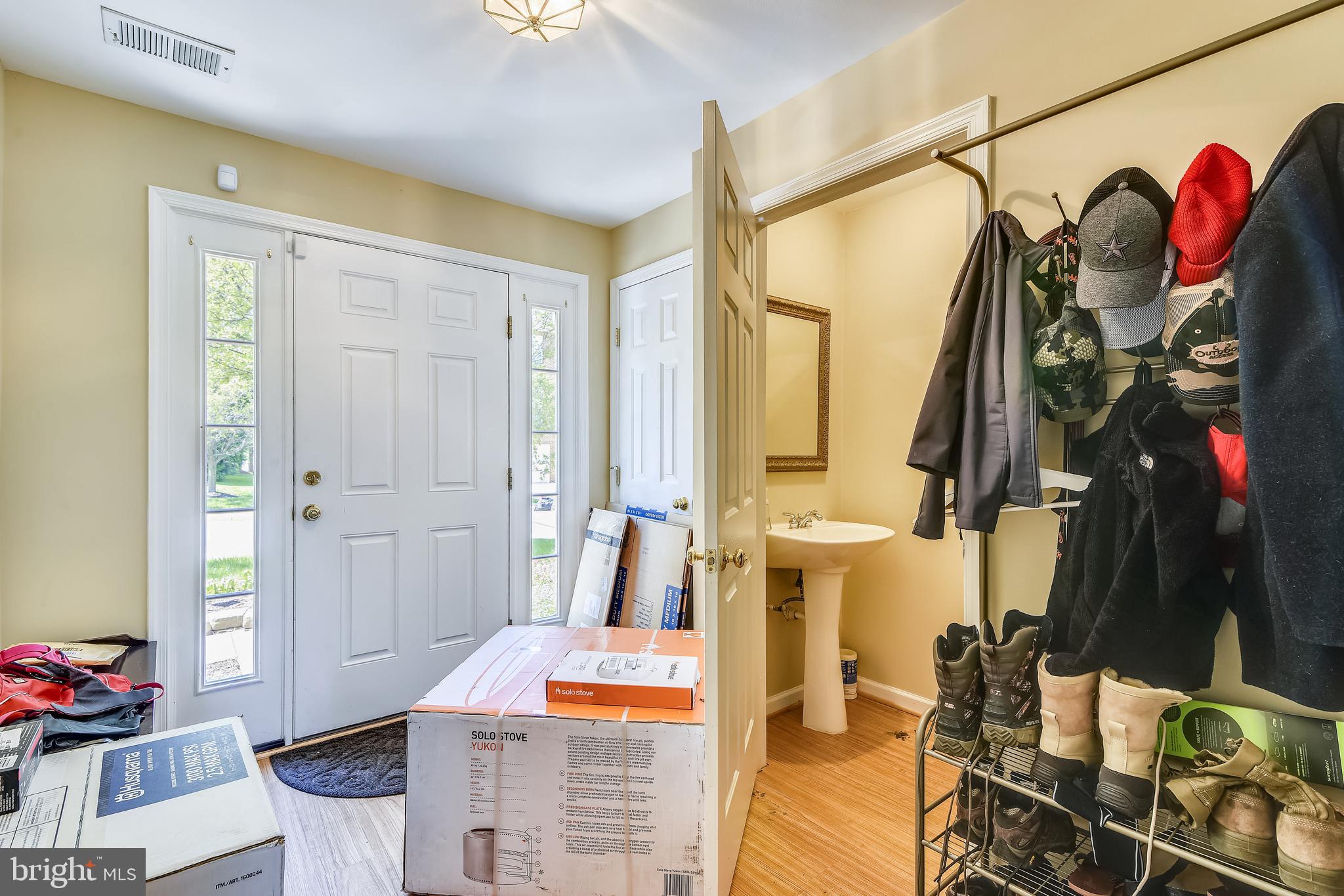 19206 Sweig Terrace Leesburg, VA 20176 - Photo 6 of 84 Coat closet and garage entry