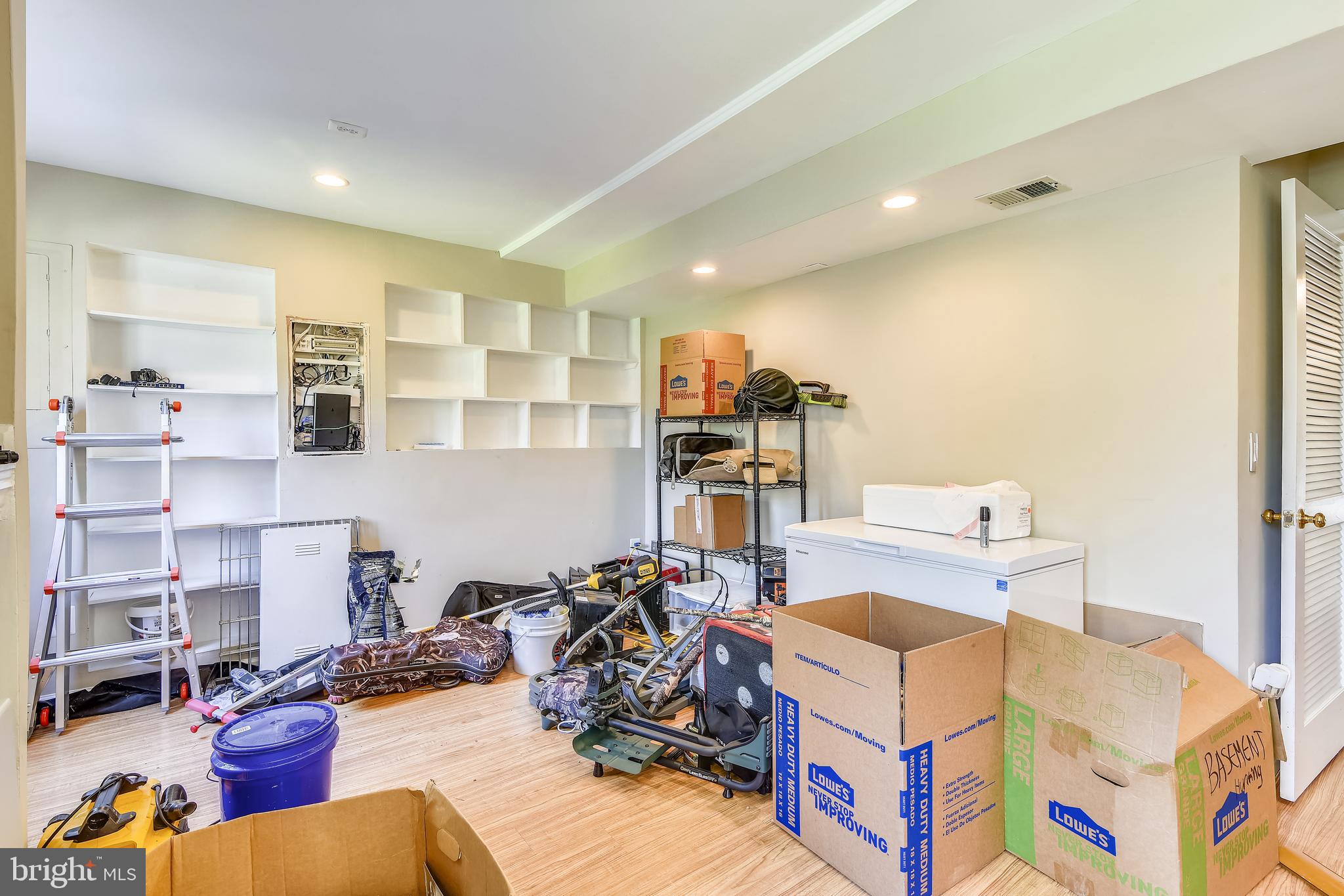 19206 Sweig Terrace Leesburg, VA 20176 - Photo 9 of 84 Built in shelving and door to backyard