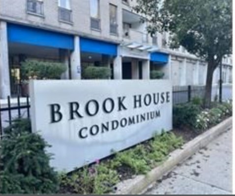 33 Pond Avenue, Unit 308 Brookline, MA 02445 - Photo 1 of 16 a sign on a street corner