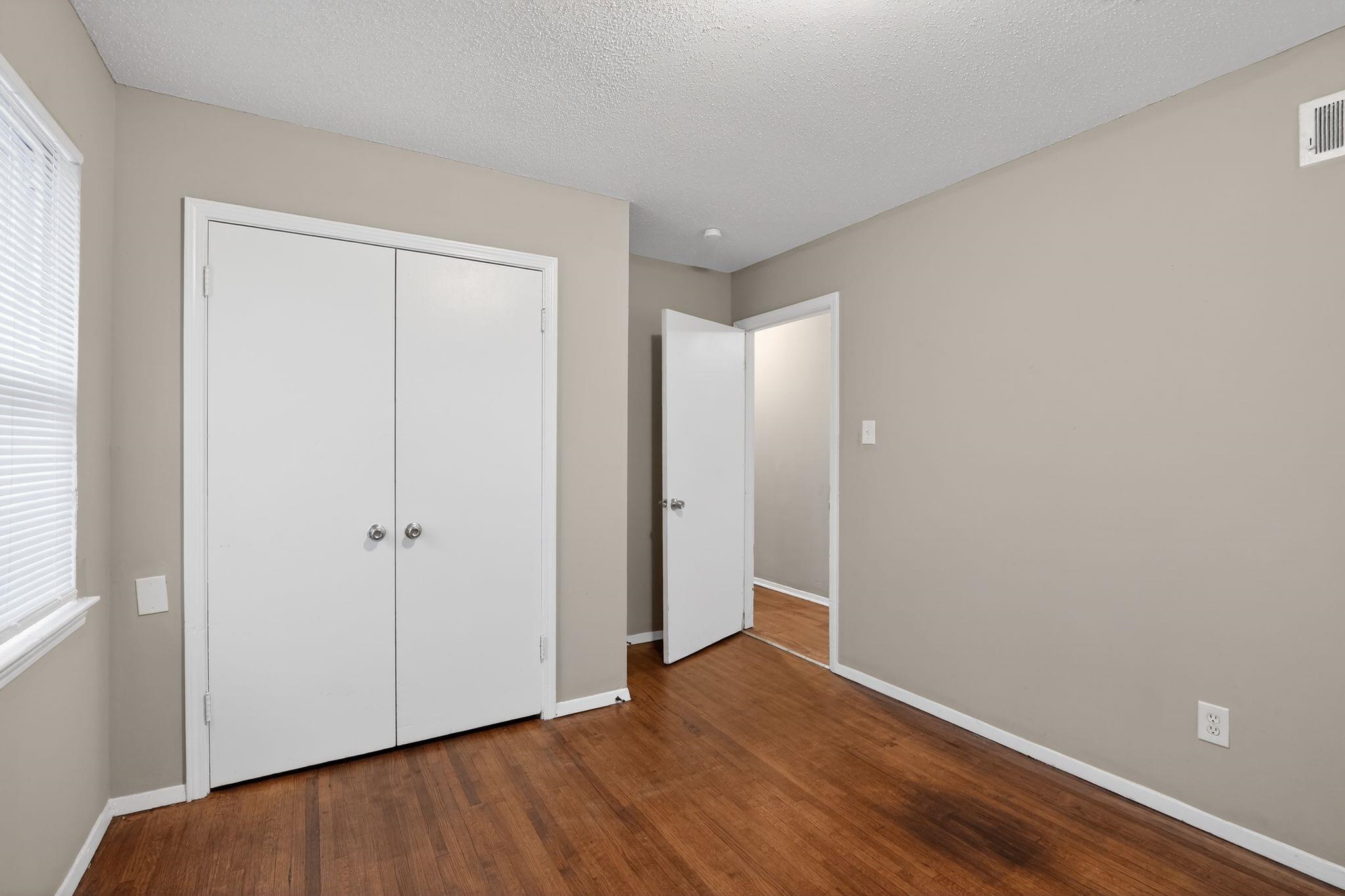 4314 Ford Road Memphis, TN 38109 - Photo 23 of 31 a view of an empty room with closet and a window