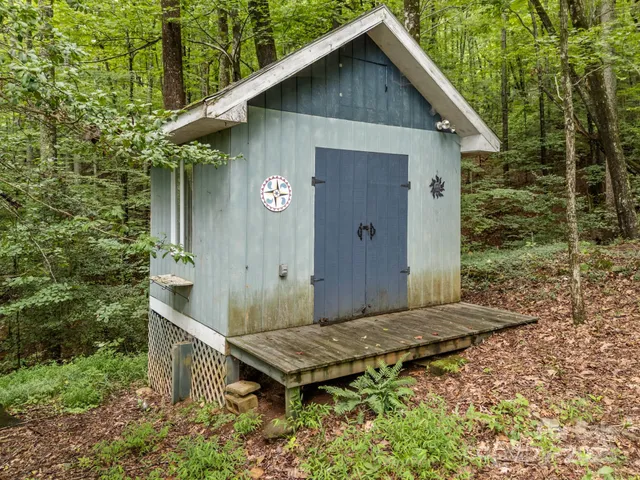 a backyard of a house with seating space