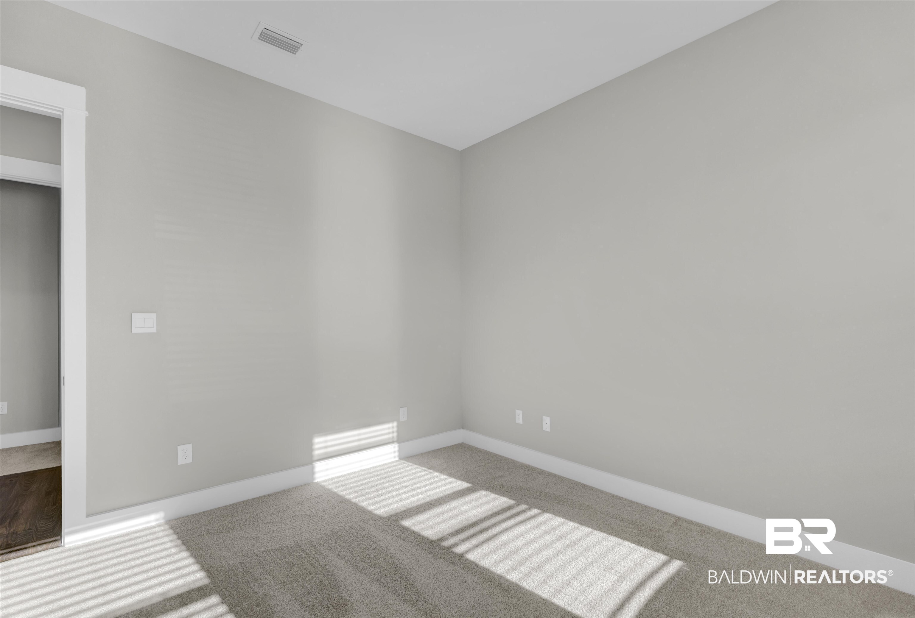 571 Morning Mist Way Fairhope, AL 36532 - Photo 32 of 47 Empty room with baseboards and carpet