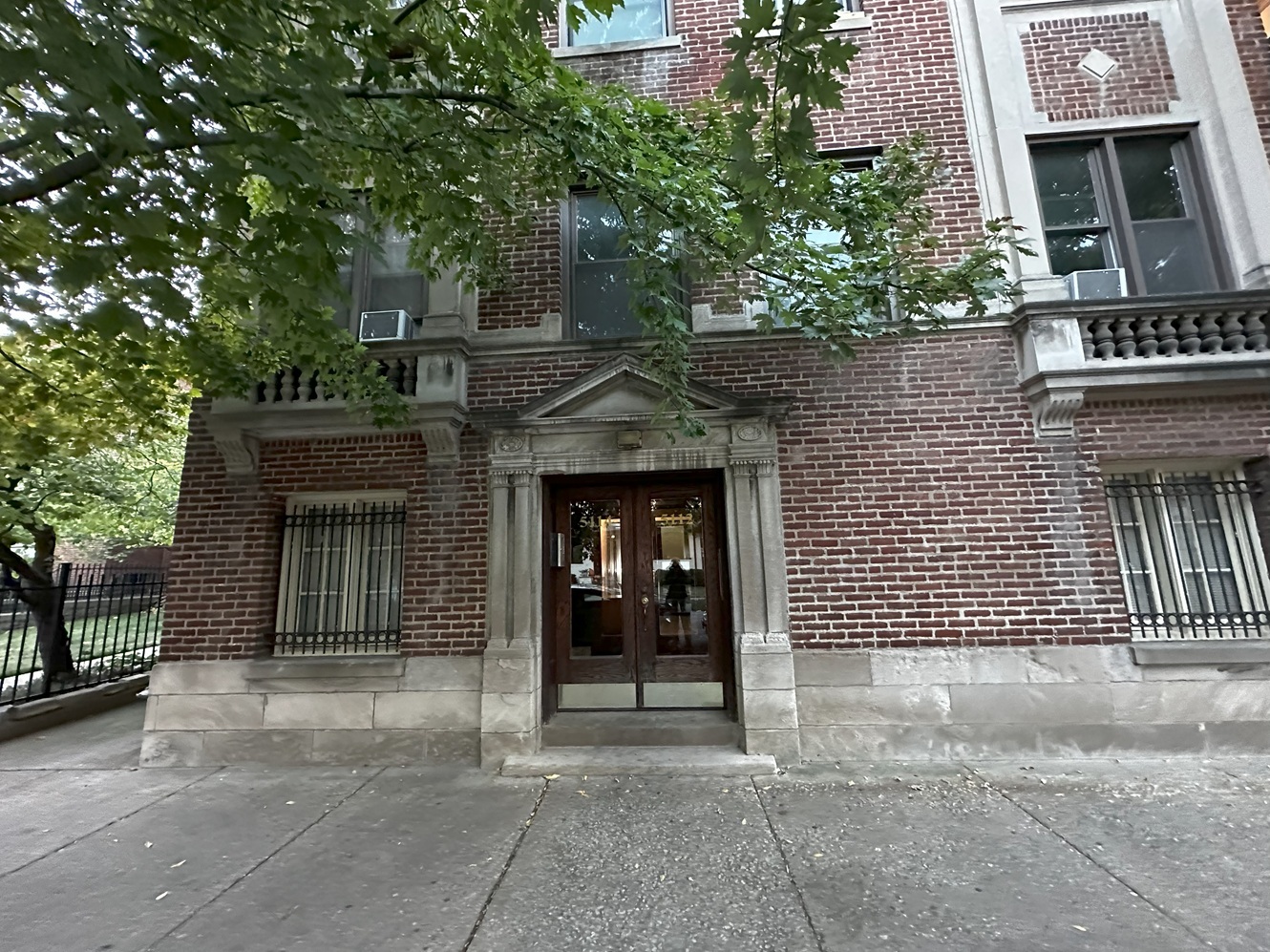 5114 South Woodlawn Avenue, Unit 3L Chicago, IL 60615 - Photo 1 of 1 front view of a house with a door and an outdoor space