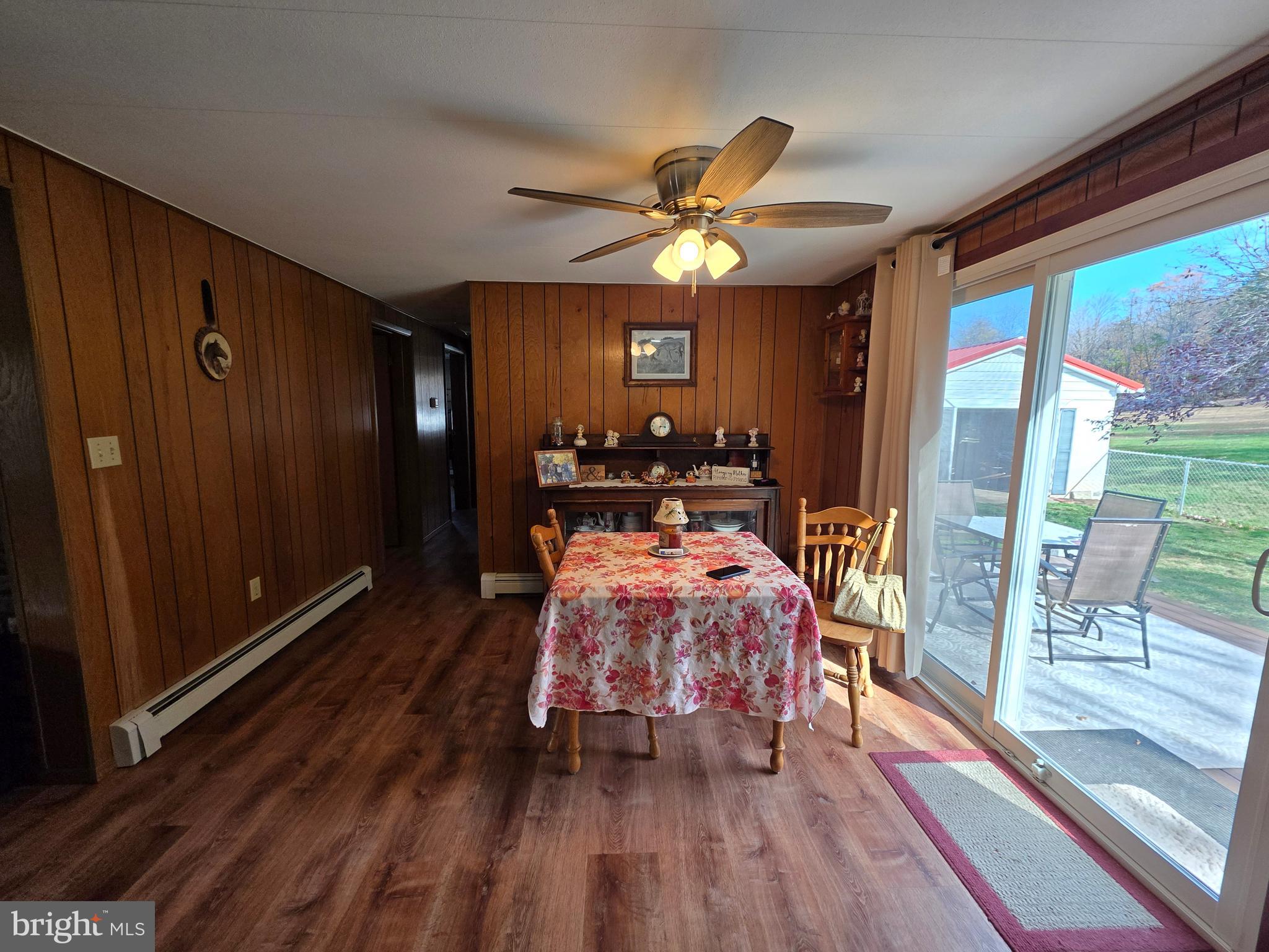 951 Johnsons Mill Road Berkeley Springs, WV 25411 - Photo 11 of 66 a bedroom with a bed and wooden floor