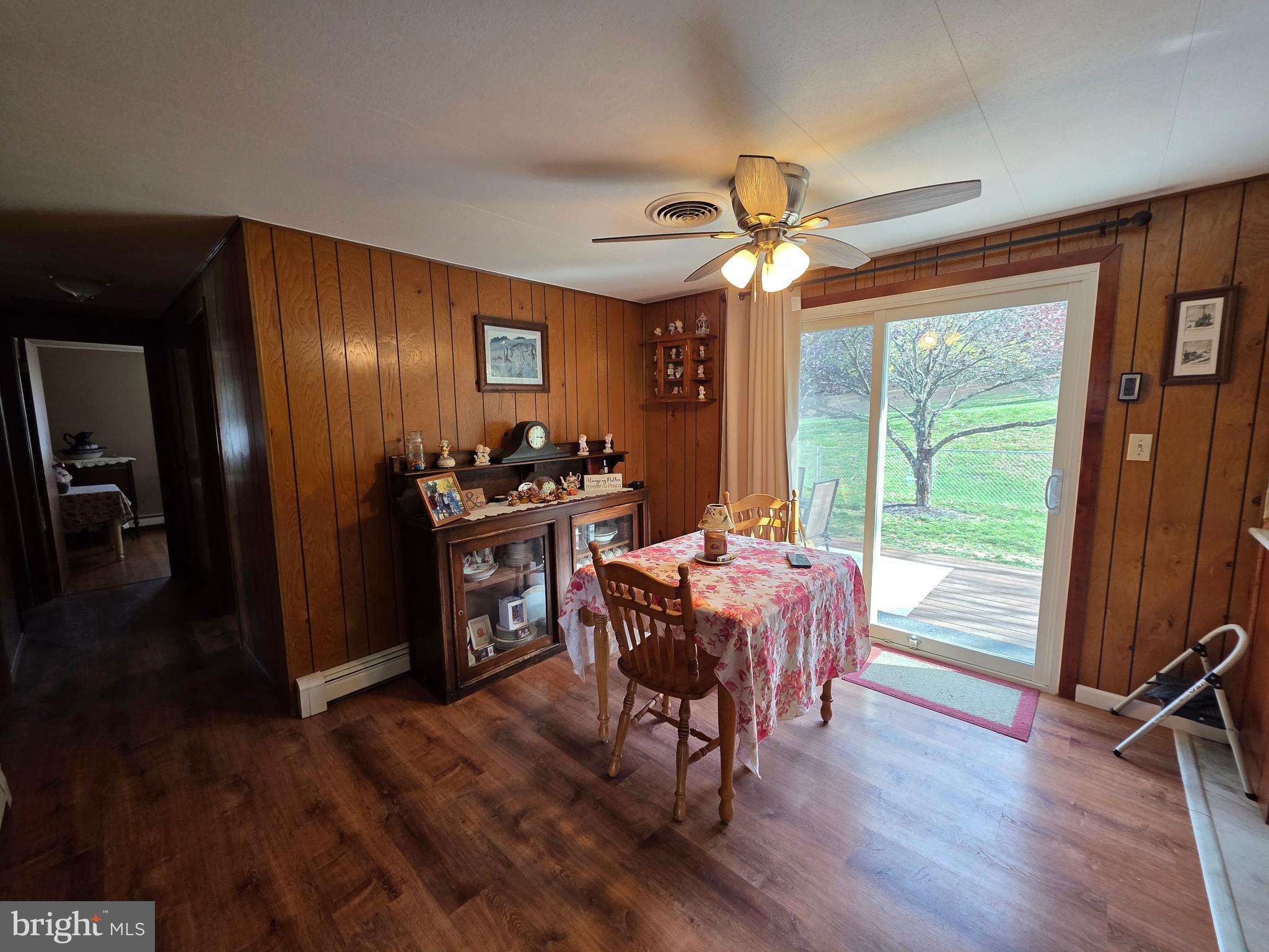 951 Johnsons Mill Road Berkeley Springs, WV 25411 - Photo 12 of 66 a view of a livingroom with furniture window and wooden floor