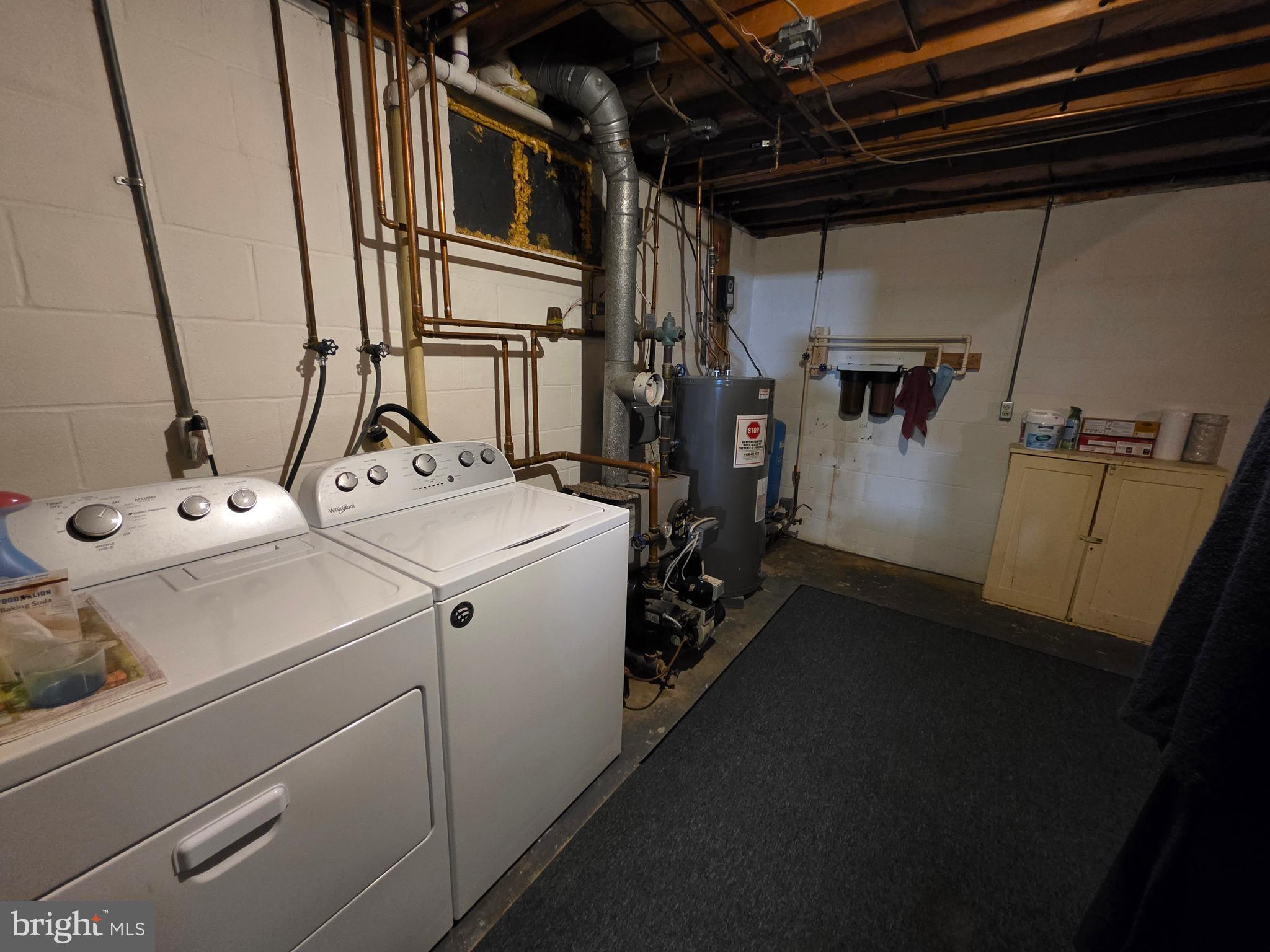 951 Johnsons Mill Road Berkeley Springs, WV 25411 - Photo 40 of 66 a utility room with dryer and washer