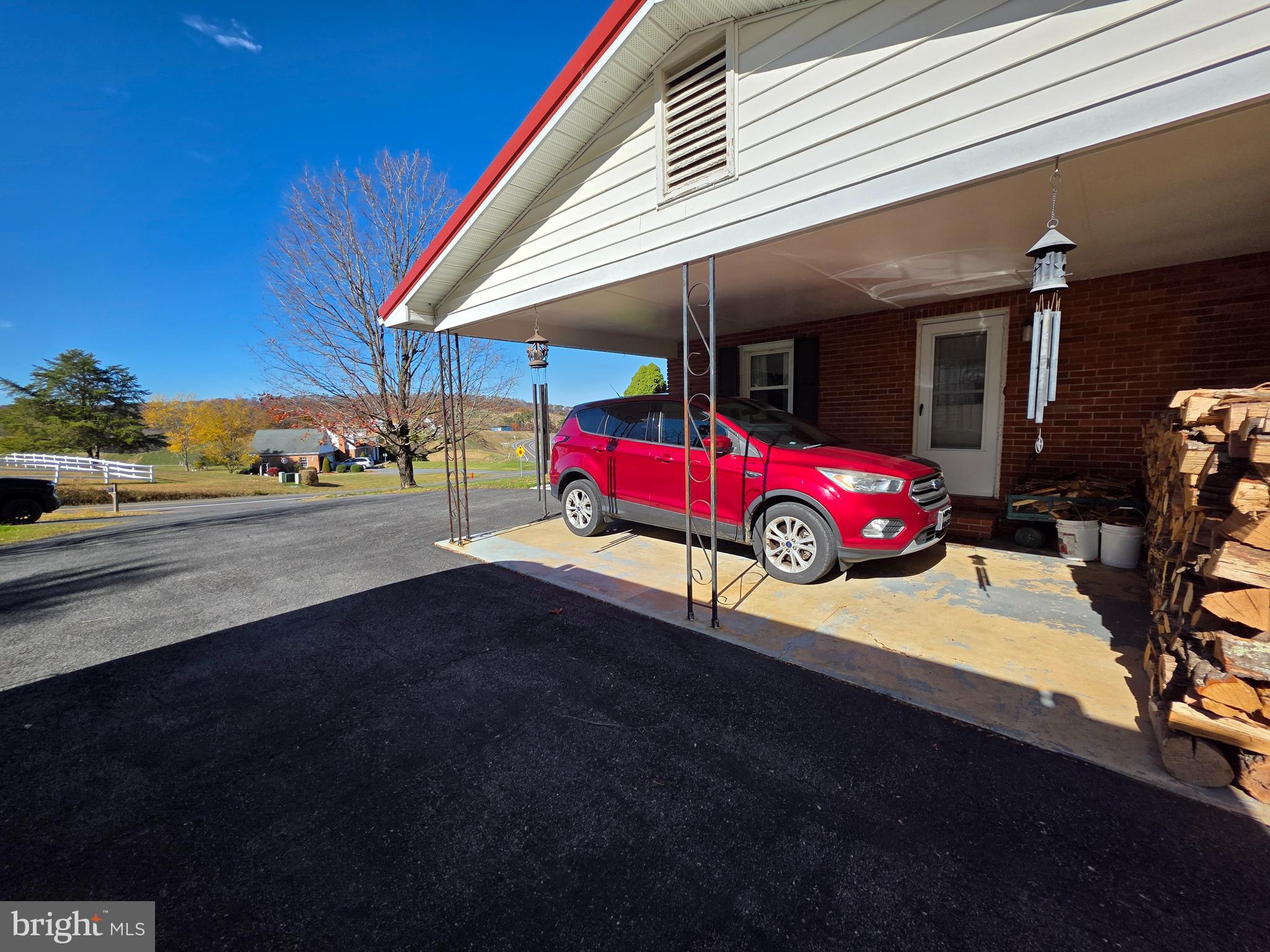 951 Johnsons Mill Road Berkeley Springs, WV 25411 - Photo 49 of 66 a view of a car park in front of house