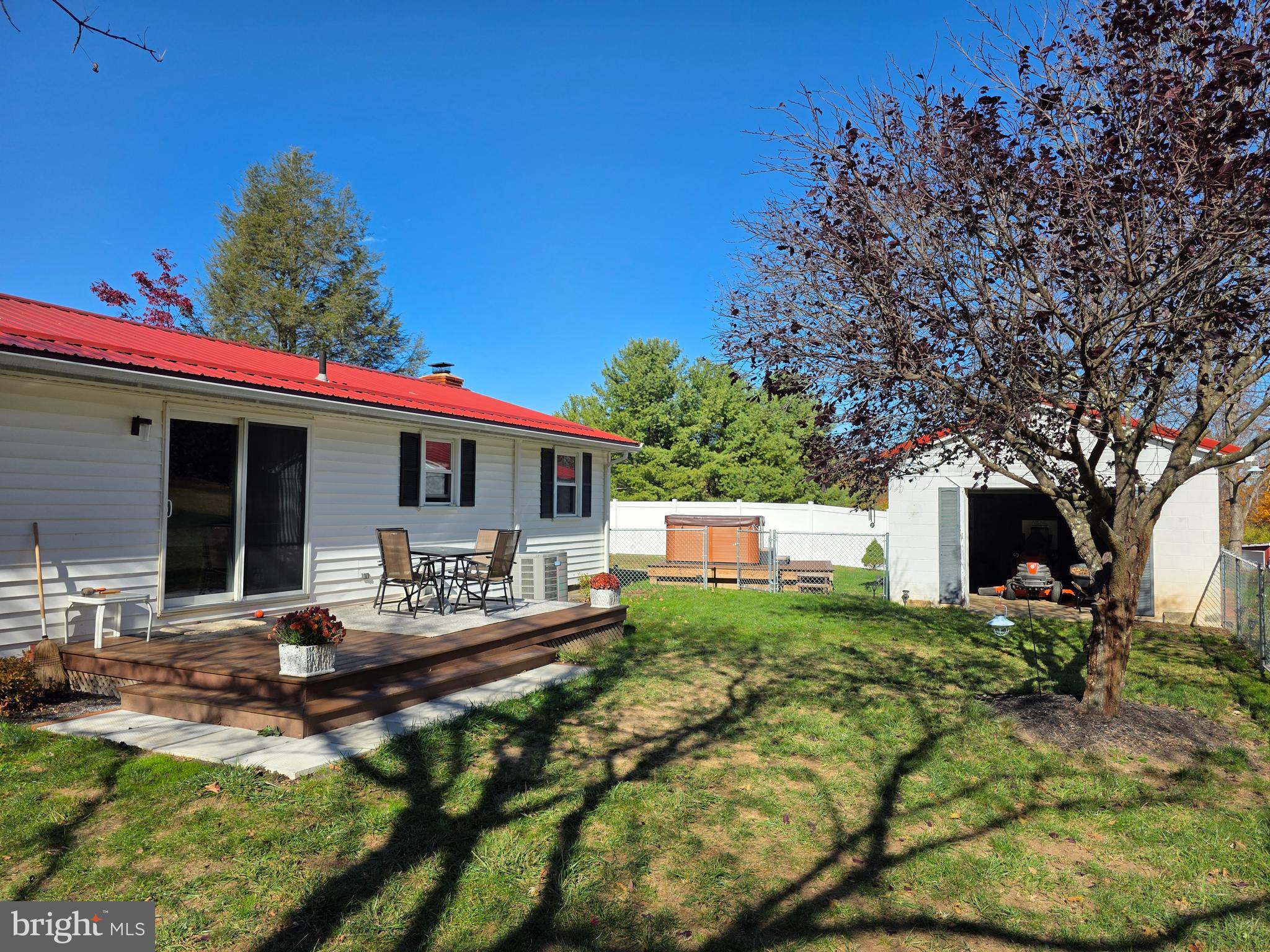 951 Johnsons Mill Road Berkeley Springs, WV 25411 - Photo 50 of 66 a house view with a sitting space fire pit and outdoor space