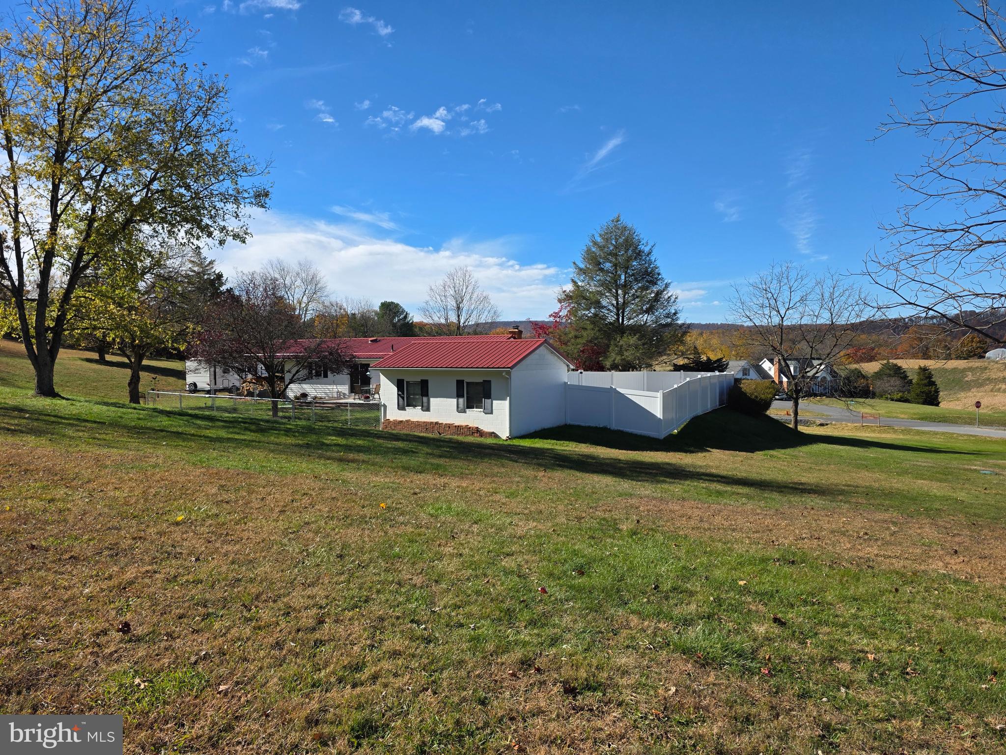 951 Johnsons Mill Road Berkeley Springs, WV 25411 - Photo 59 of 66 a view of a big house with a big yard