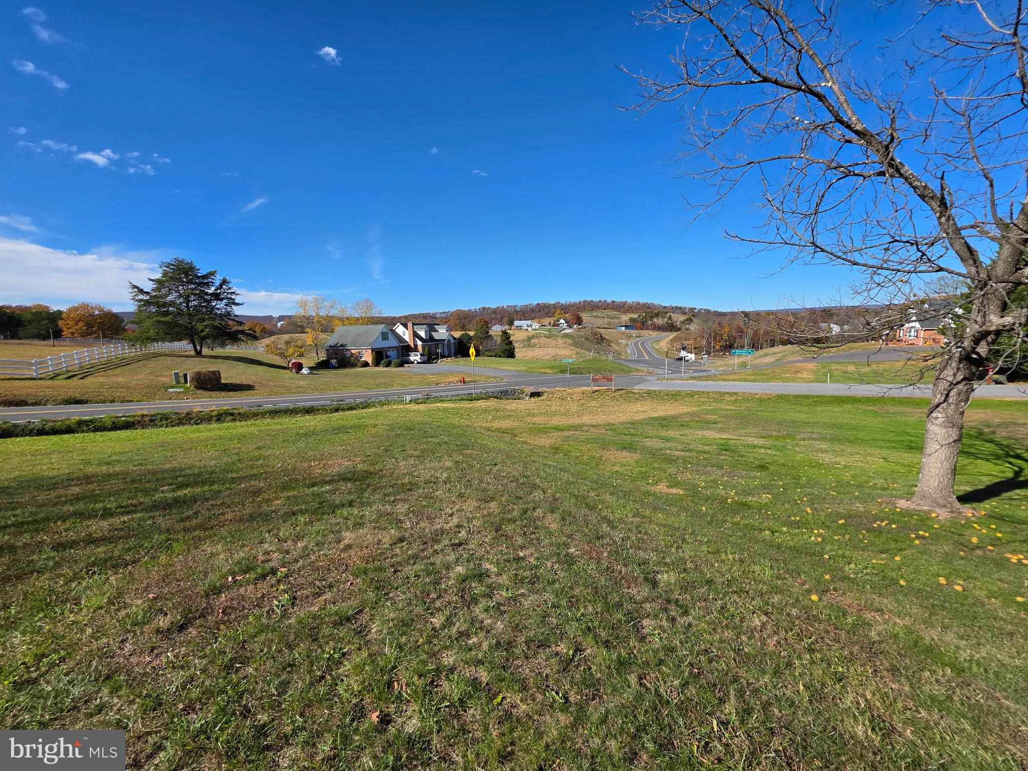 951 Johnsons Mill Road Berkeley Springs, WV 25411 - Photo 64 of 66 a view of a big yard with an outdoor space and seating