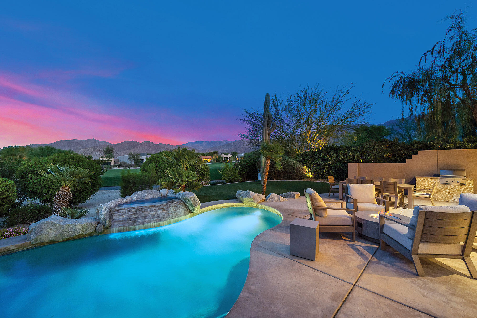 178 Wikil Place Palm Desert, CA 92260 - Photo 14 of 15 a garden view with a seating space