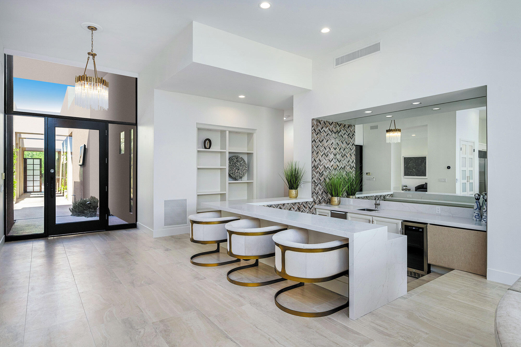 178 Wikil Place Palm Desert, CA 92260 - Photo 3 of 15 a kitchen with sink and refrigerator