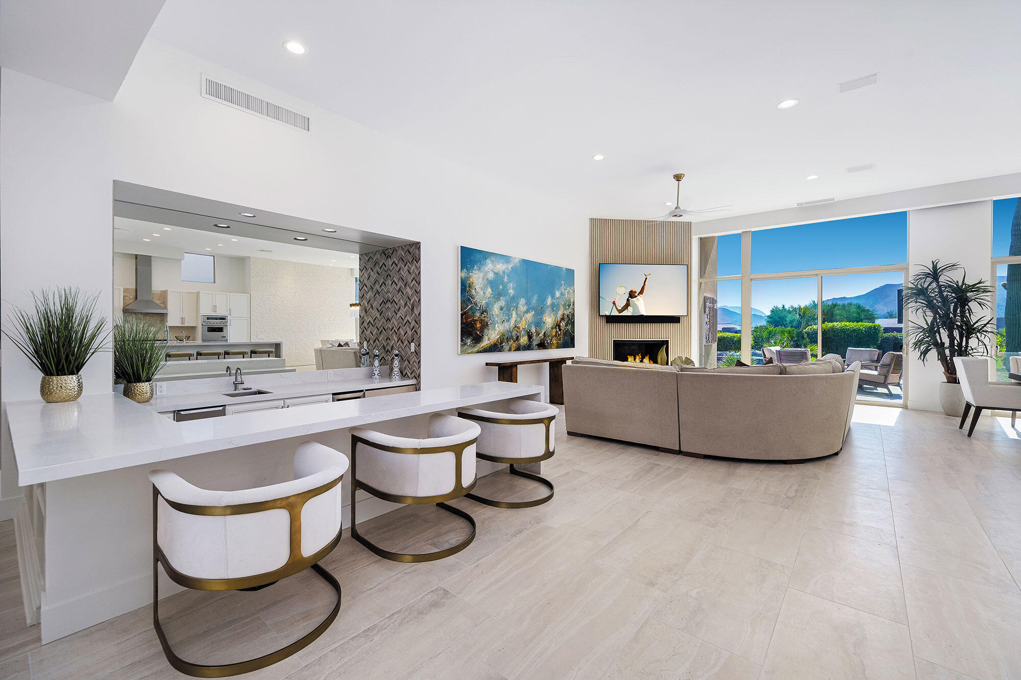 178 Wikil Place Palm Desert, CA 92260 - Photo 5 of 15 a living room with furniture and a potted plant