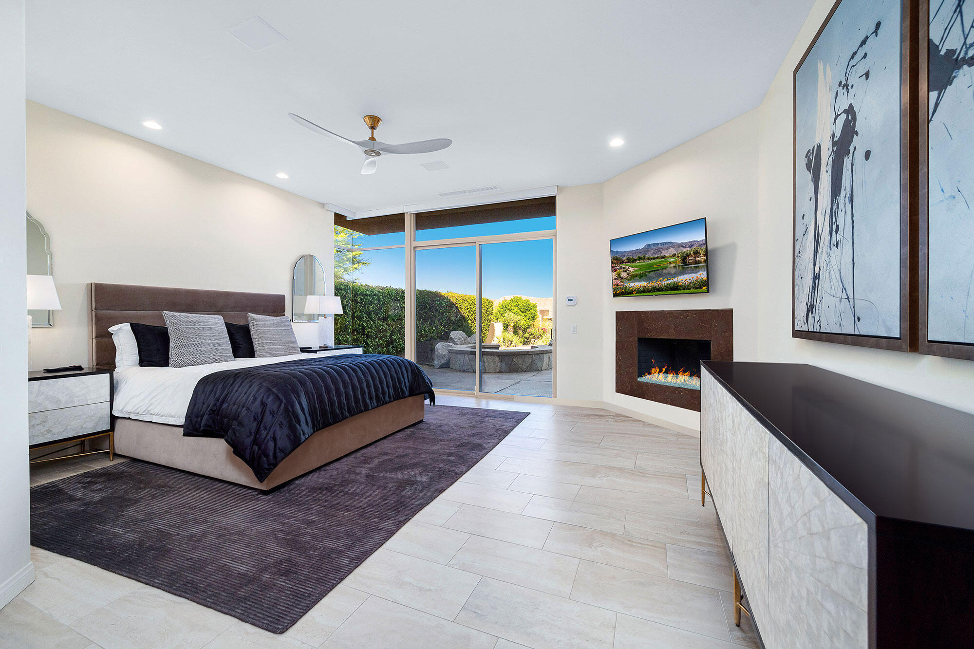 178 Wikil Place Palm Desert, CA 92260 - Photo 9 of 15 a spacious bedroom with a bed and a couch