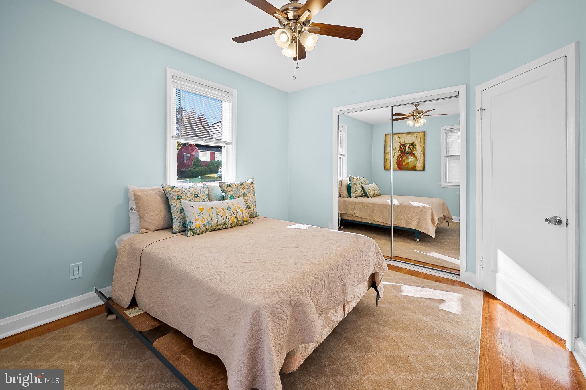 7922 Underhill Road Rosedale, MD 21237 - Photo 22 of 41 a bedroom with bed and window
