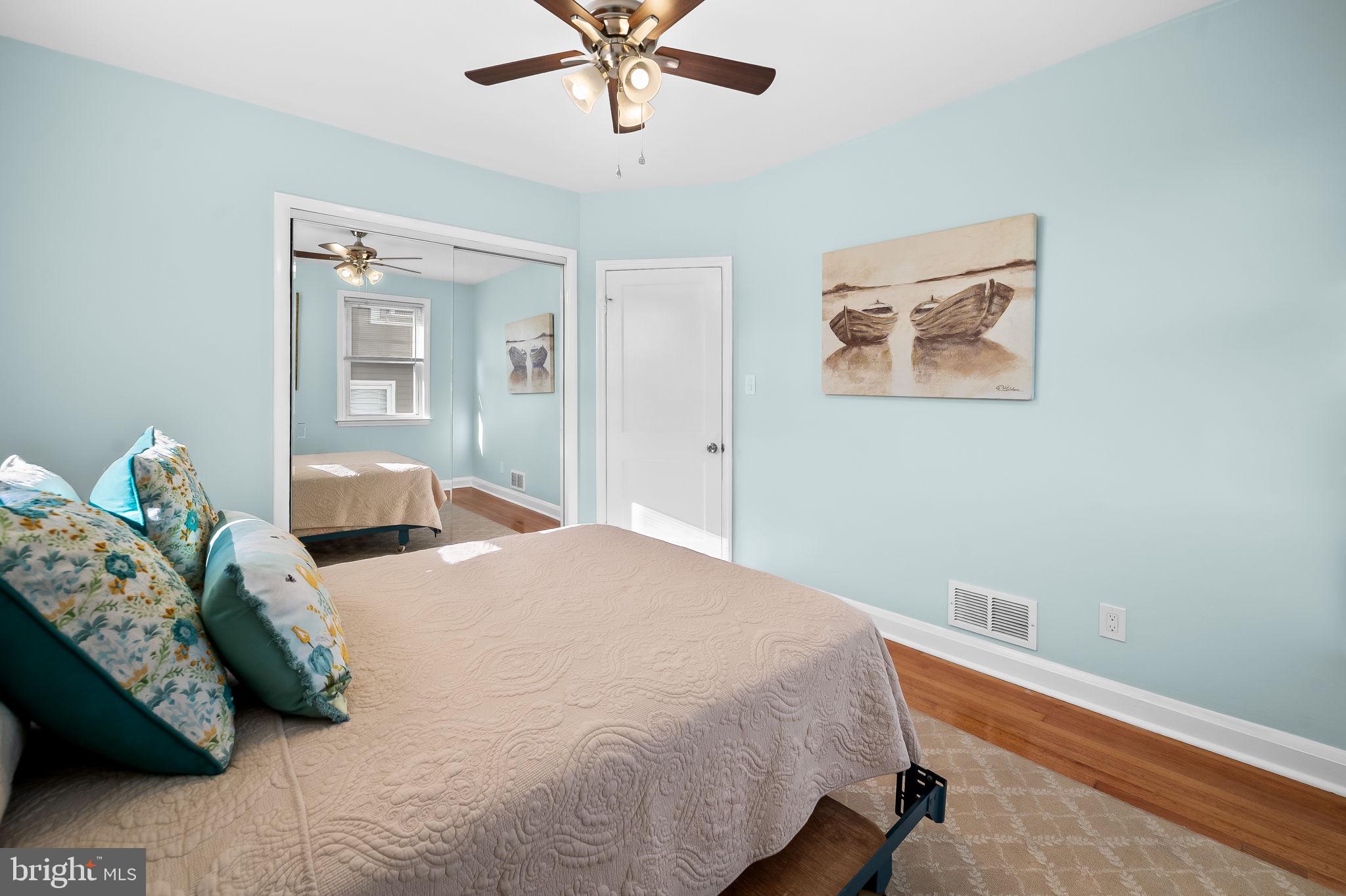 7922 Underhill Road Rosedale, MD 21237 - Photo 23 of 41 a bedroom with a bed and window