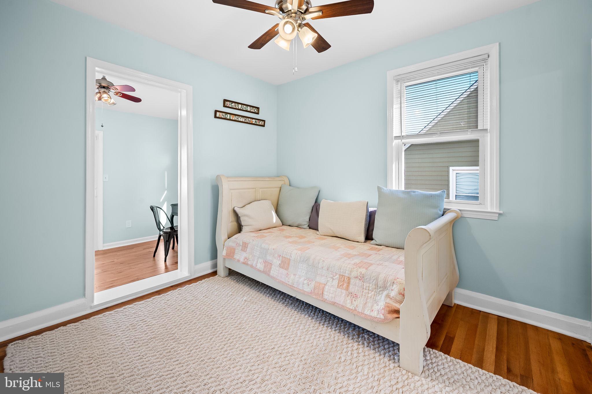 7922 Underhill Road Rosedale, MD 21237 - Photo 24 of 41 a bedroom with a bed and a window