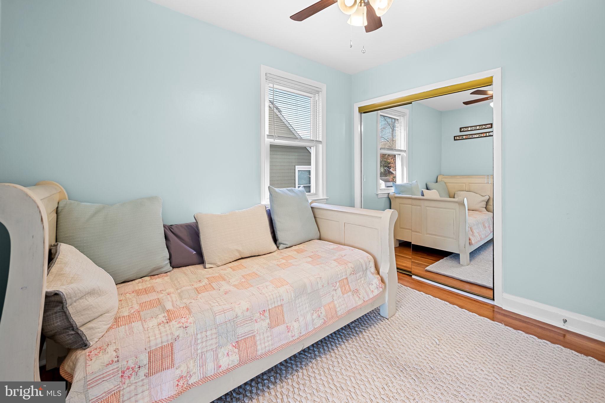 7922 Underhill Road Rosedale, MD 21237 - Photo 25 of 41 a bedroom with a bed and furniture