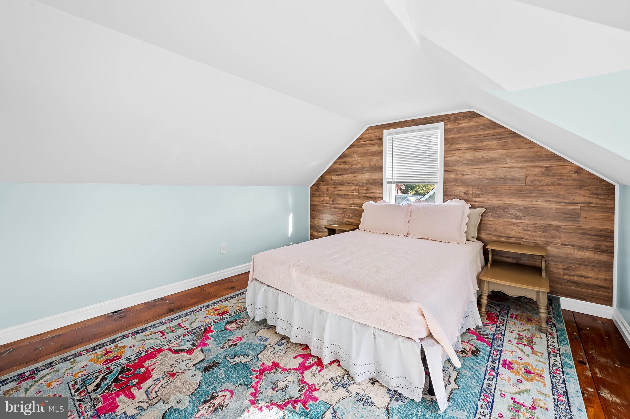 7922 Underhill Road Rosedale, MD 21237 - Photo 30 of 41 a bedroom with a bed and a bookshelf