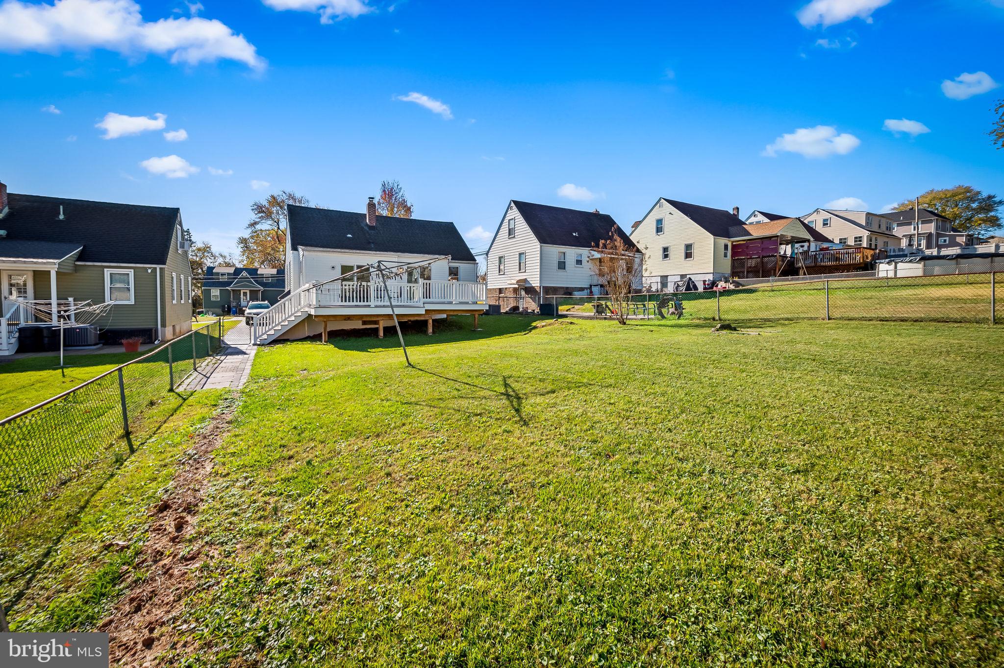 7922 Underhill Road Rosedale, MD 21237 - Photo 38 of 41 a view of a house with a big yard and large trees
