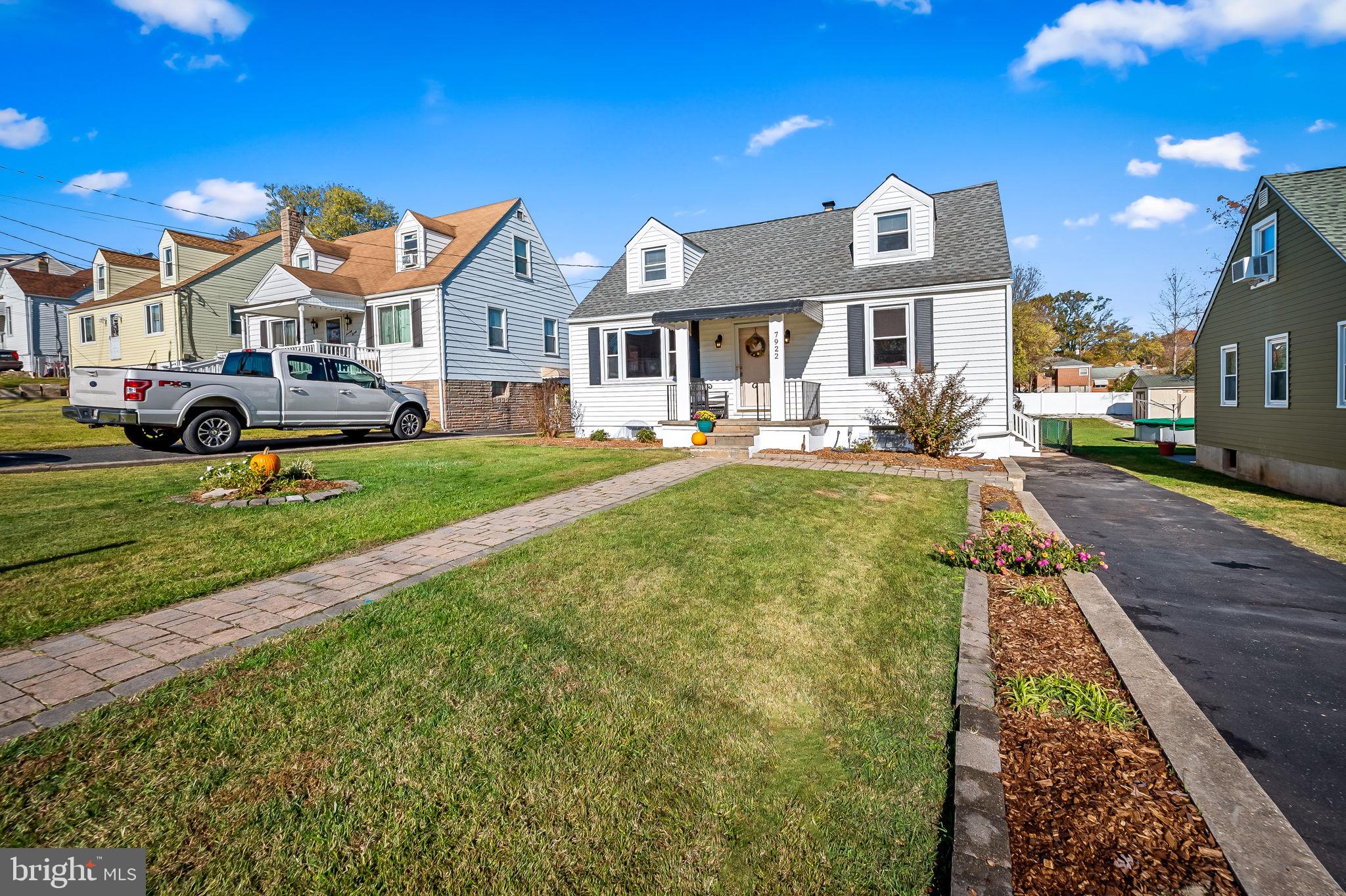 7922 Underhill Road Rosedale, MD 21237 - Photo 41 of 41 a front view of a residential houses with yard and parking