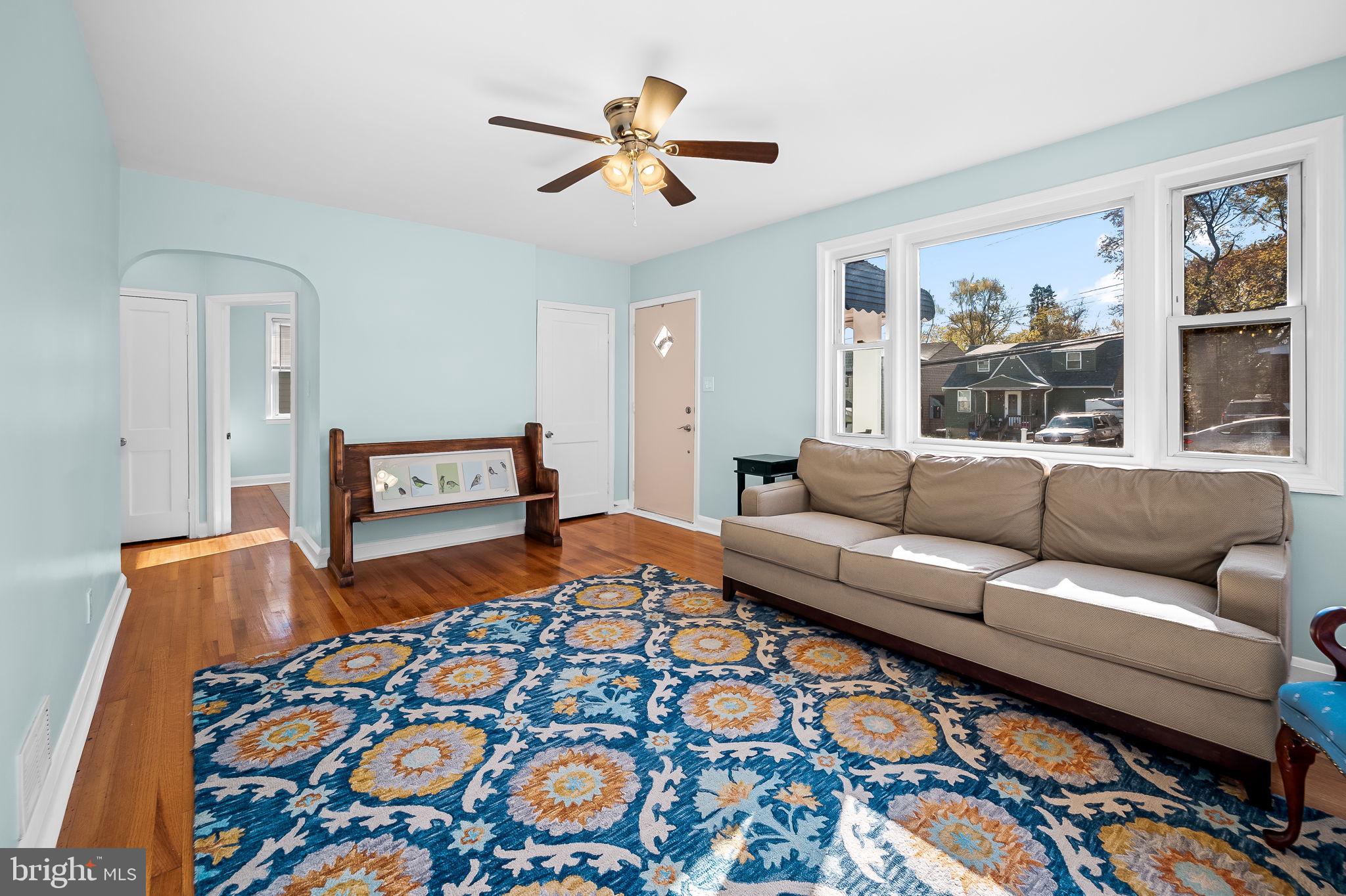 7922 Underhill Road Rosedale, MD 21237 - Photo 6 of 41 a living room with a couch and a rug