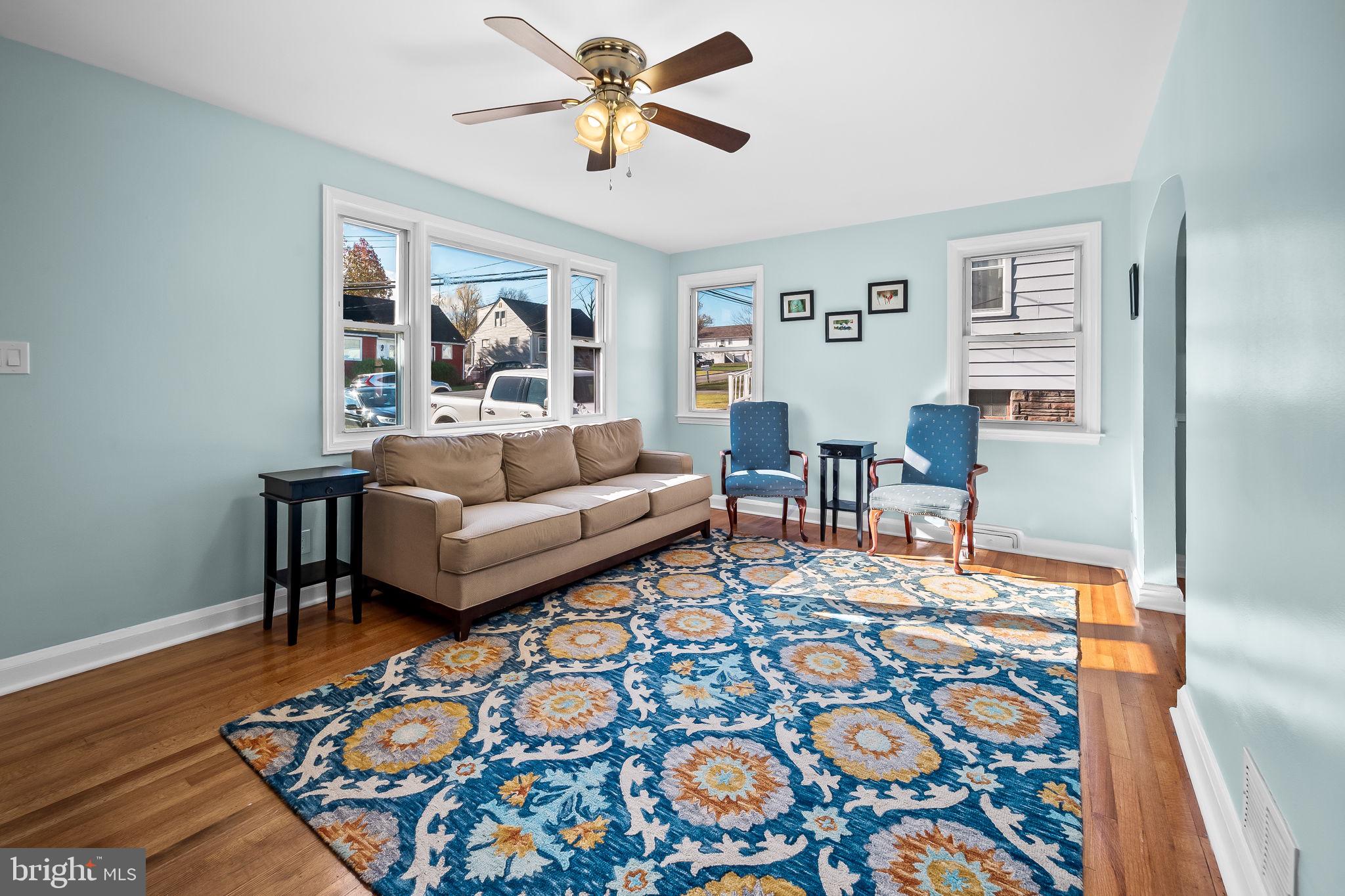 7922 Underhill Road Rosedale, MD 21237 - Photo 7 of 41 a living room with furniture and a rug