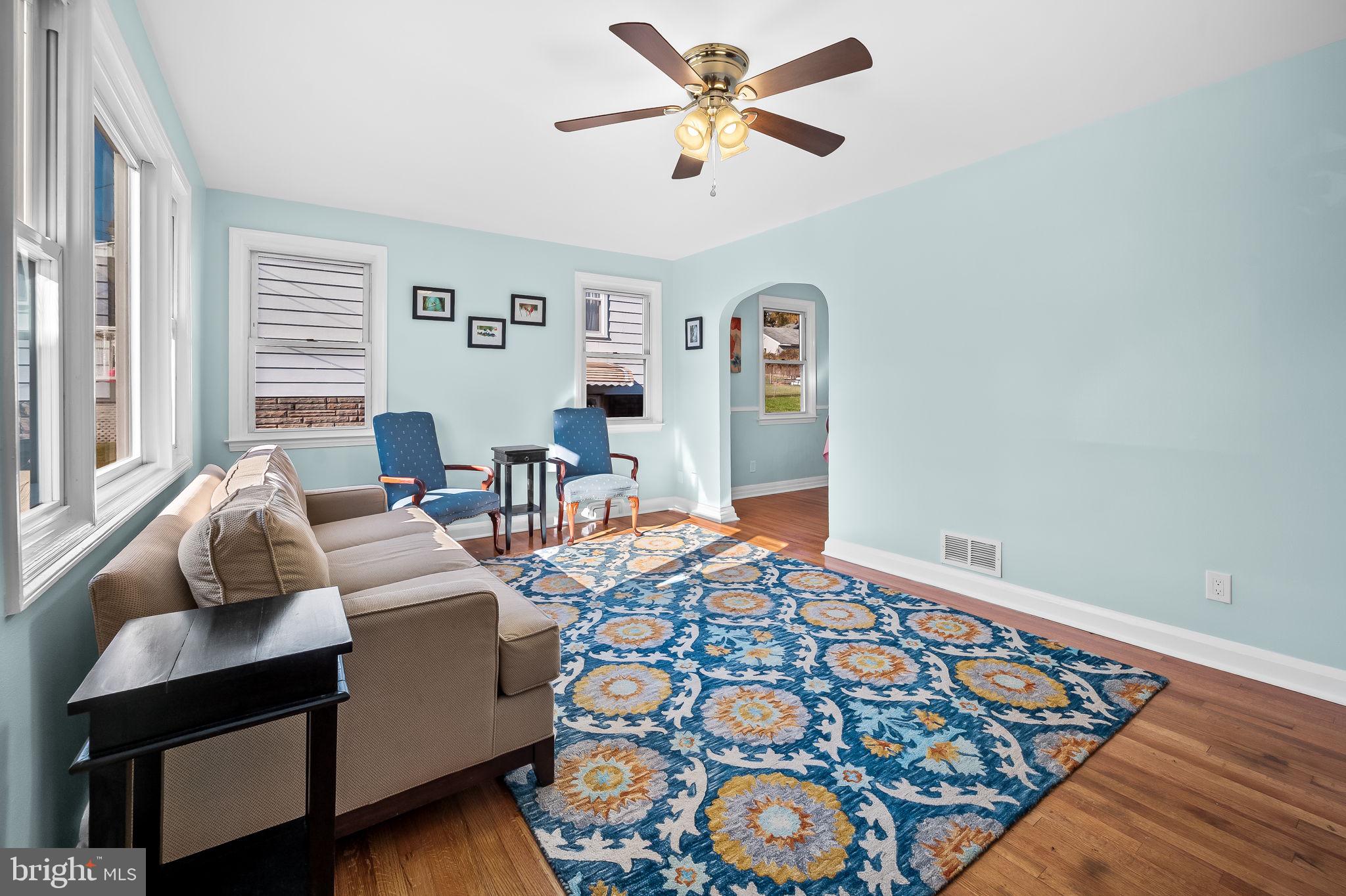7922 Underhill Road Rosedale, MD 21237 - Photo 8 of 41 a living room with furniture and wooden floor