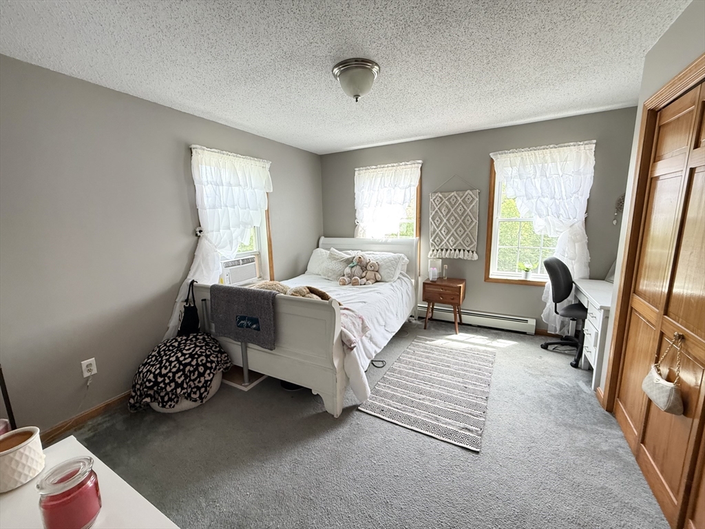 222 Bridge Street Warren, MA 01083 - Photo 25 of 40 a bedroom with bed and a window