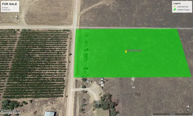 a view of yard from a bathroom