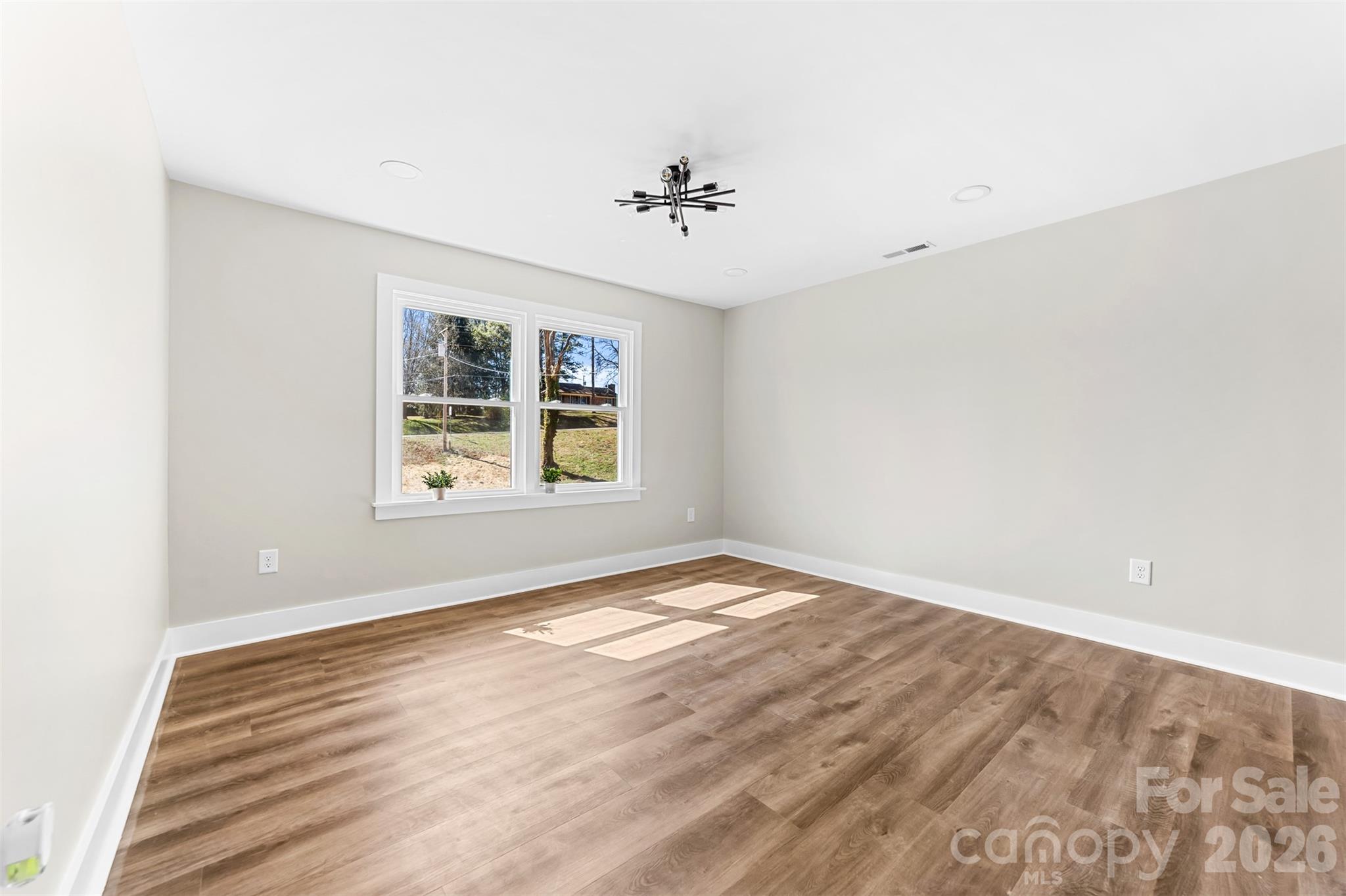 205 Redding Road Stanley, NC 28164 - Photo 15 of 34 an empty room with windows