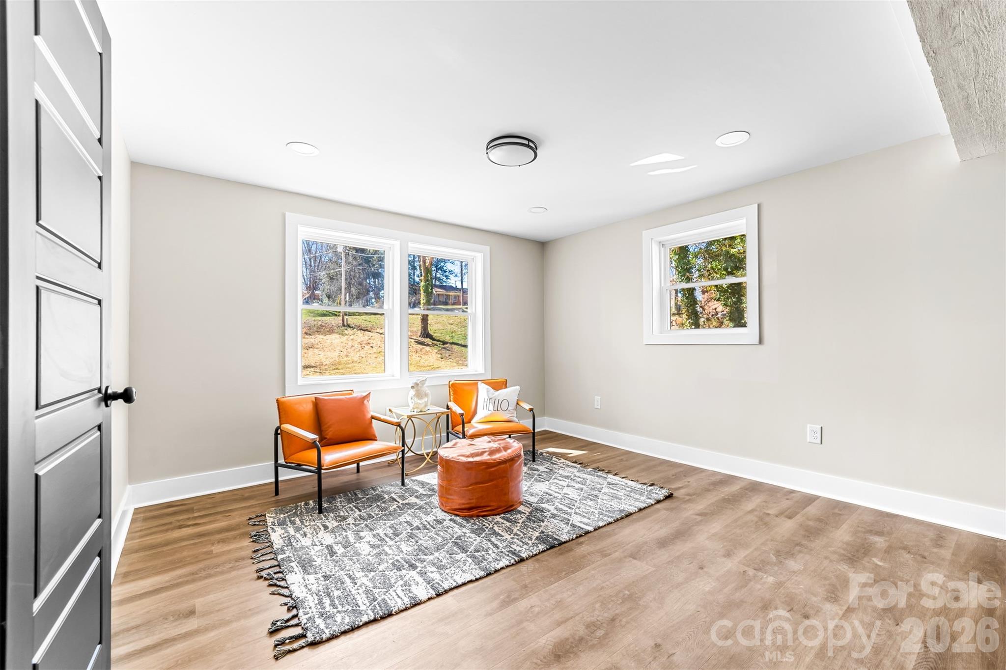 205 Redding Road Stanley, NC 28164 - Photo 26 of 34 a living room with blue couches and a coffee table
