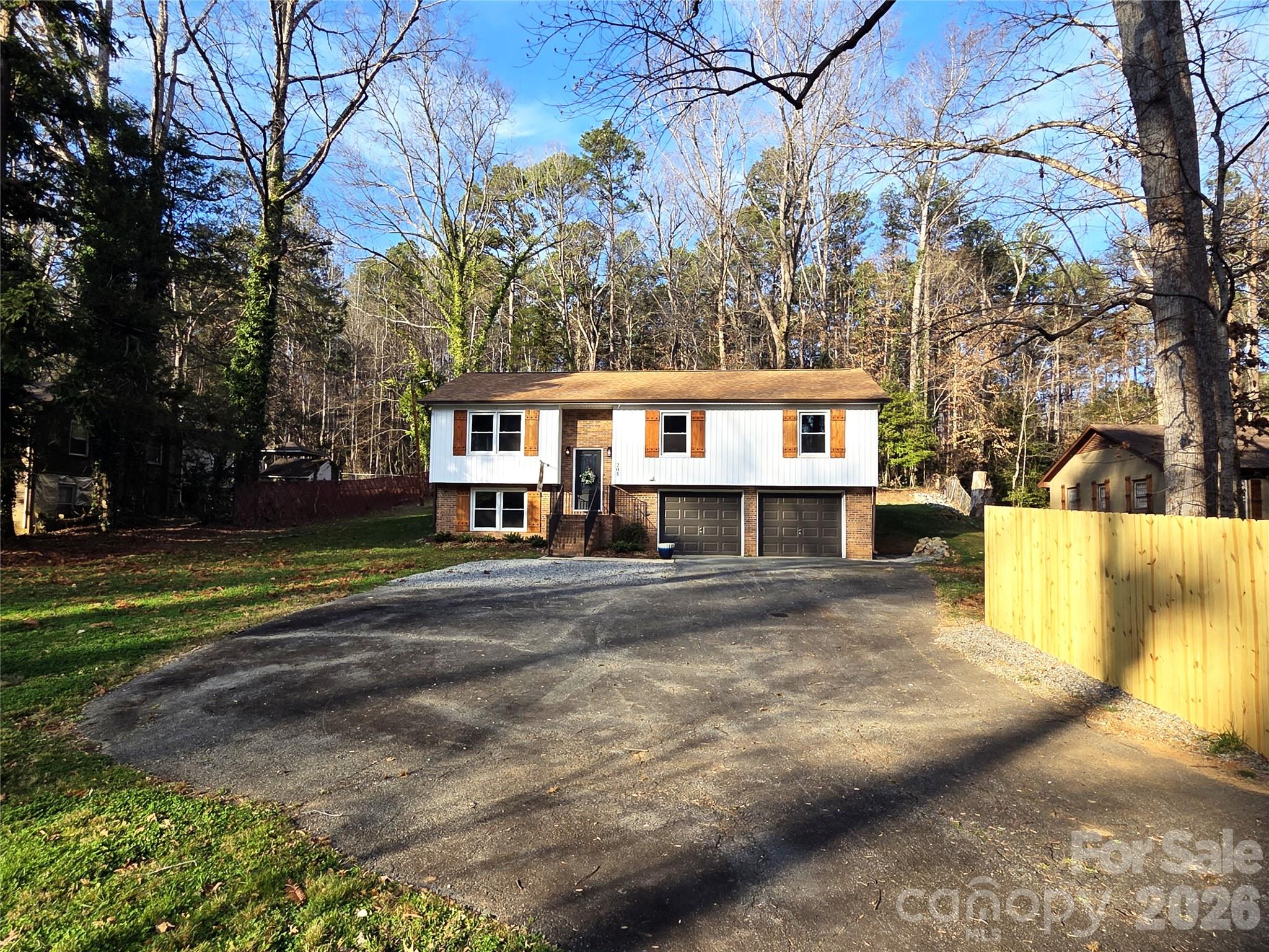 205 Redding Road Stanley, NC 28164 - Photo 3 of 34 a view of house with outdoor space and street view