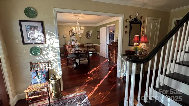 a living room with furniture flat screen tv and a fireplace