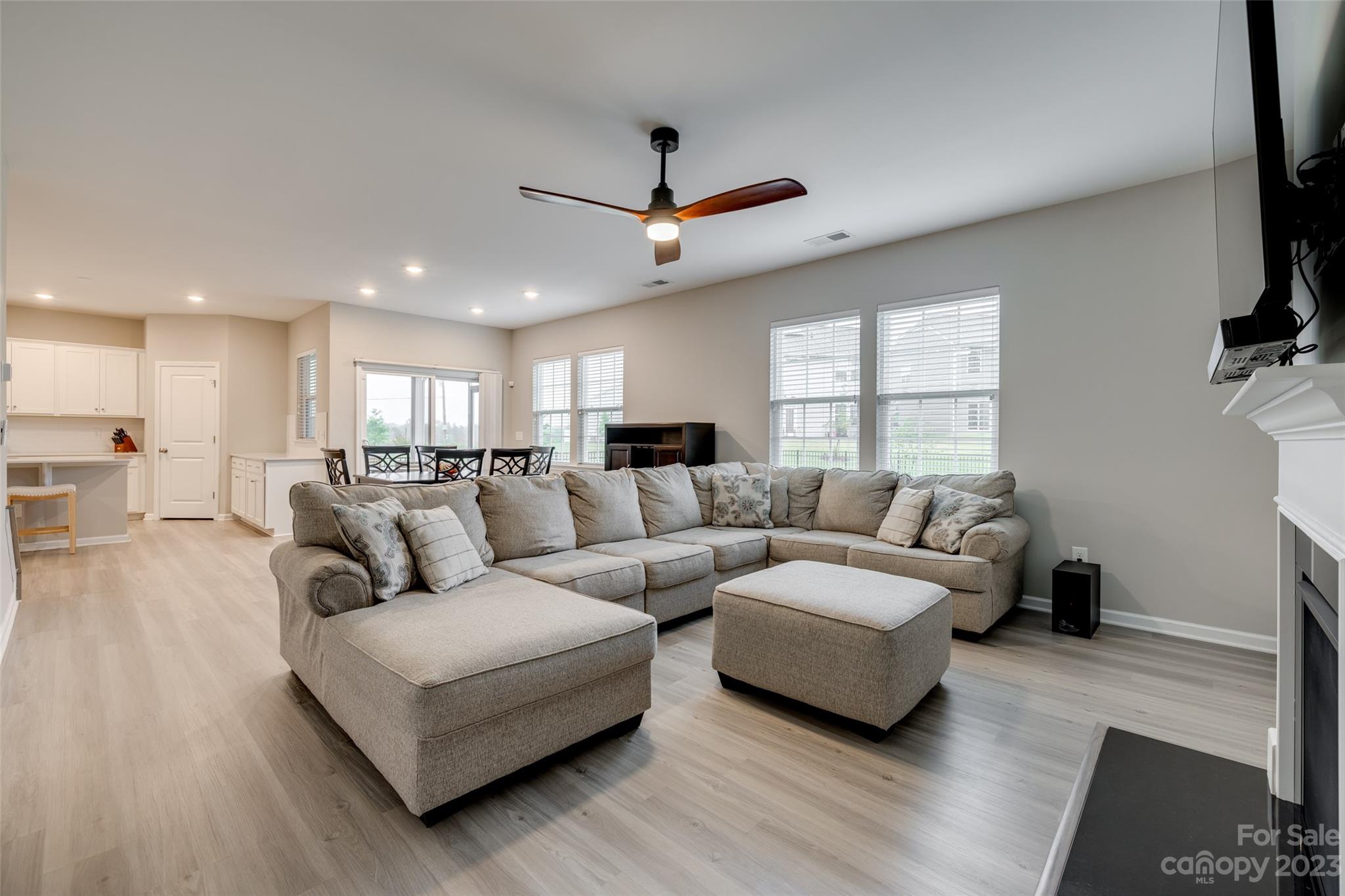 1656 Corwin Bend Road Tega Cay, SC 29708 - Photo 23 of 47 a living room with furniture and a flat screen tv