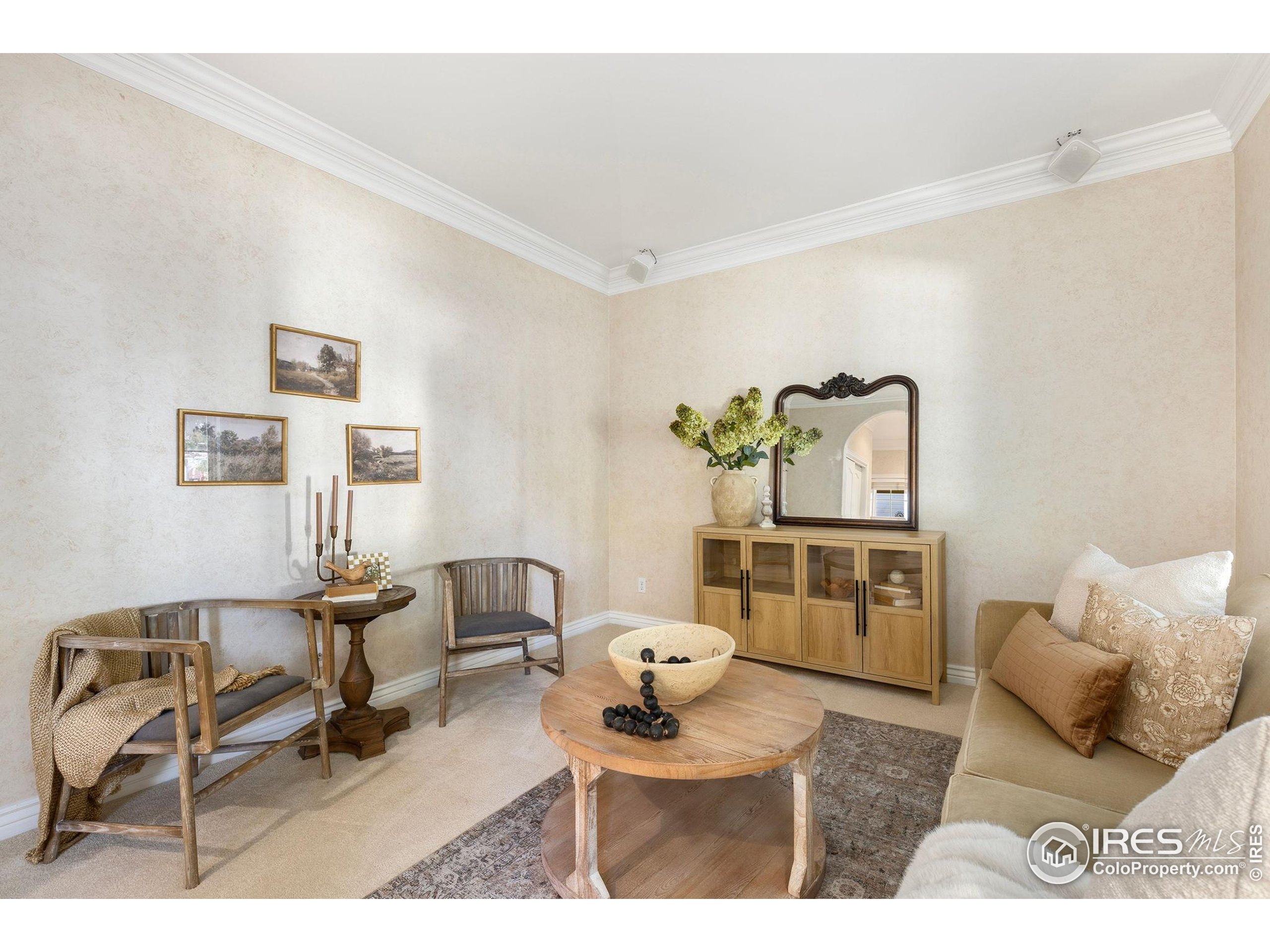 961 5th Street Berthoud, CO 80513 - Photo 17 of 35 a living room with furniture and a couch