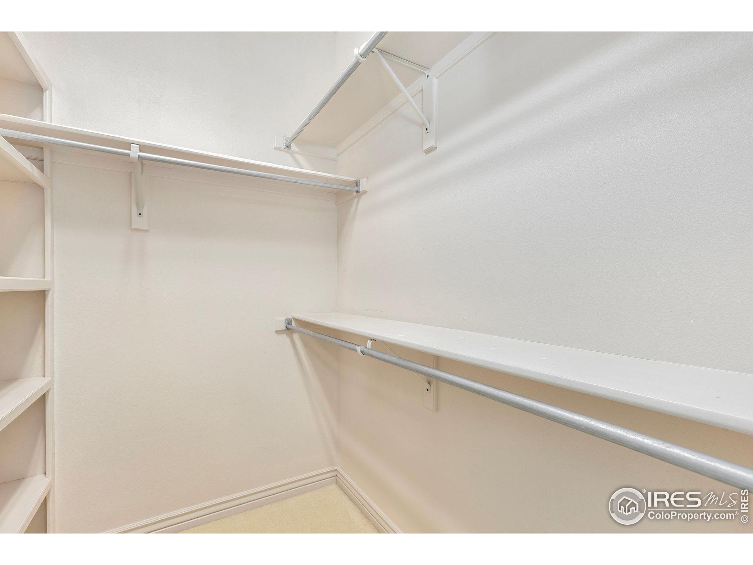 961 5th Street Berthoud, CO 80513 - Photo 20 of 35 a view of small space with racks on the wall