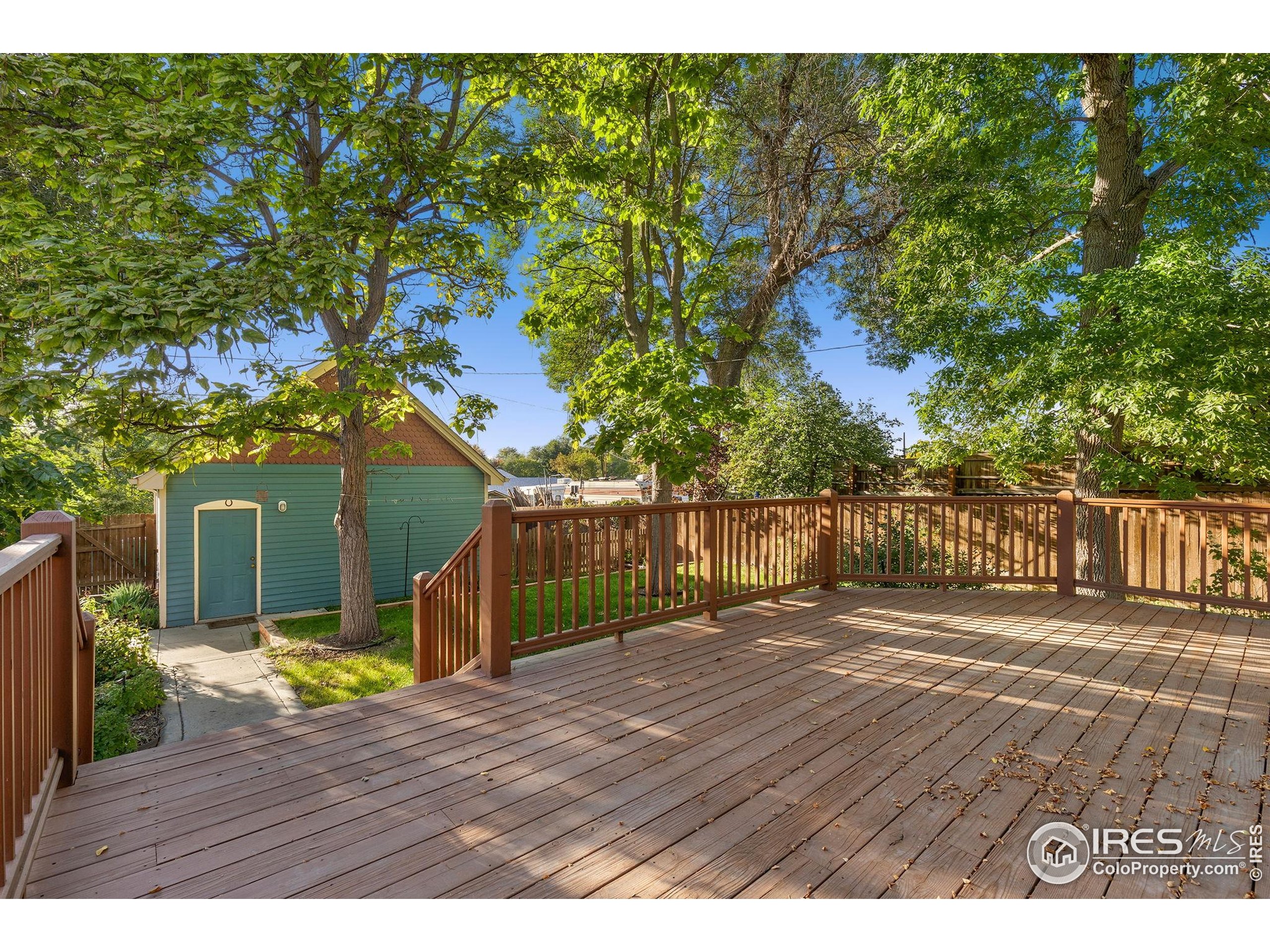 961 5th Street Berthoud, CO 80513 - Photo 25 of 35 a view of entryway with wooden floor