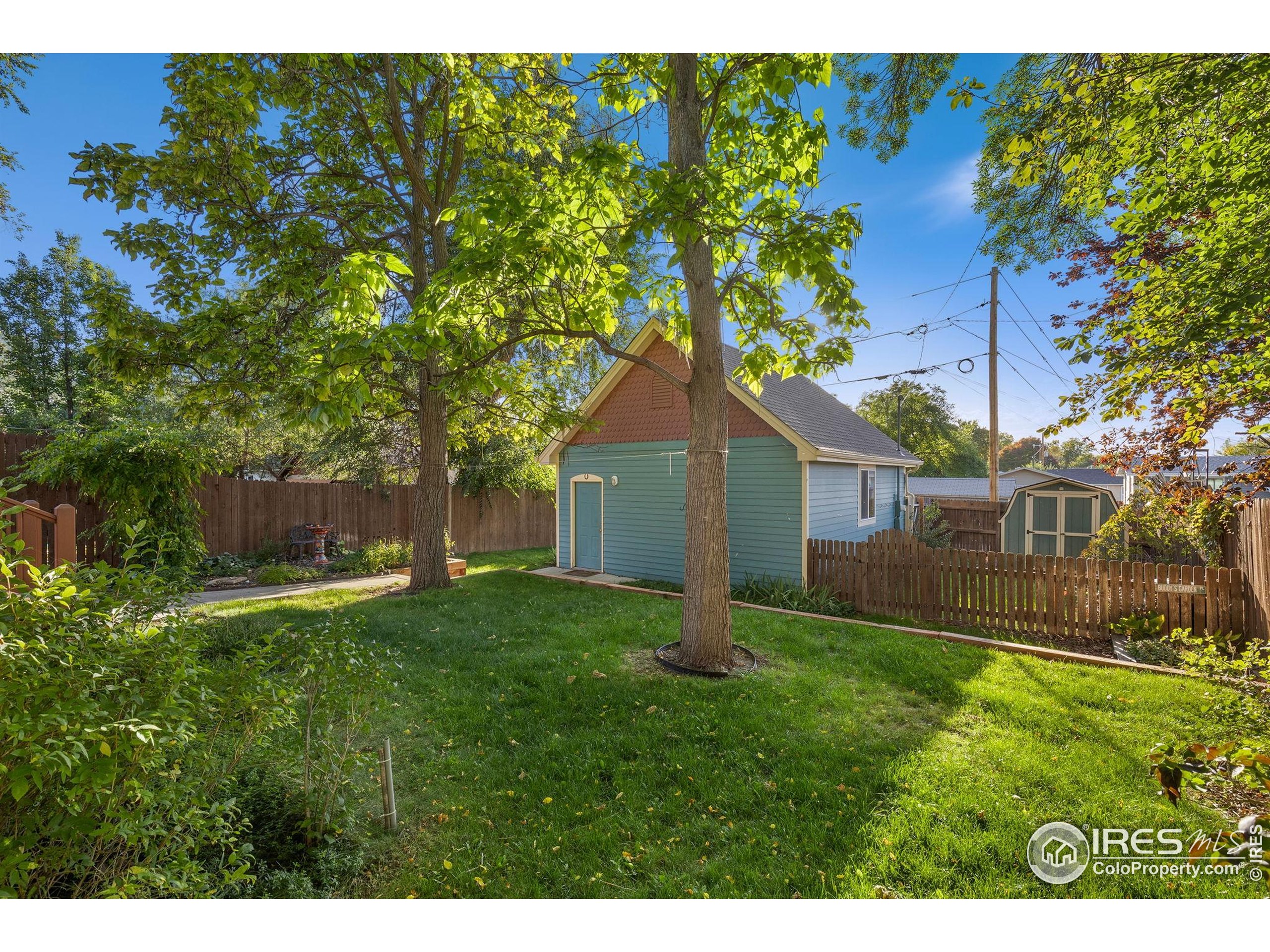 961 5th Street Berthoud, CO 80513 - Photo 27 of 35 a house view with a garden space
