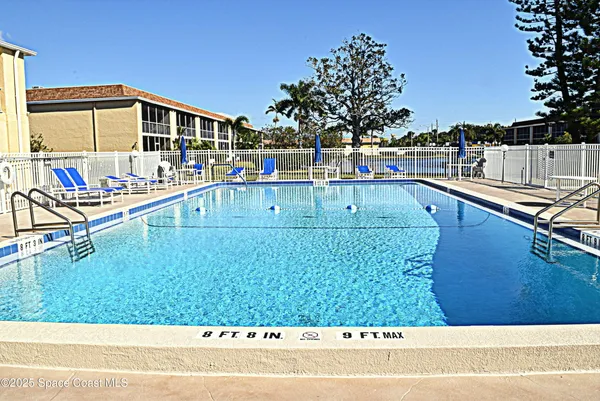 a view of a house with a swimming pool