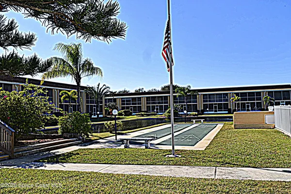 a view of a swimming pool with a lounge chairs