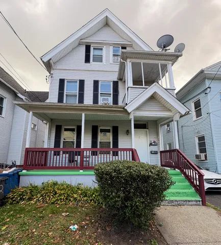 a front view of a house with porch