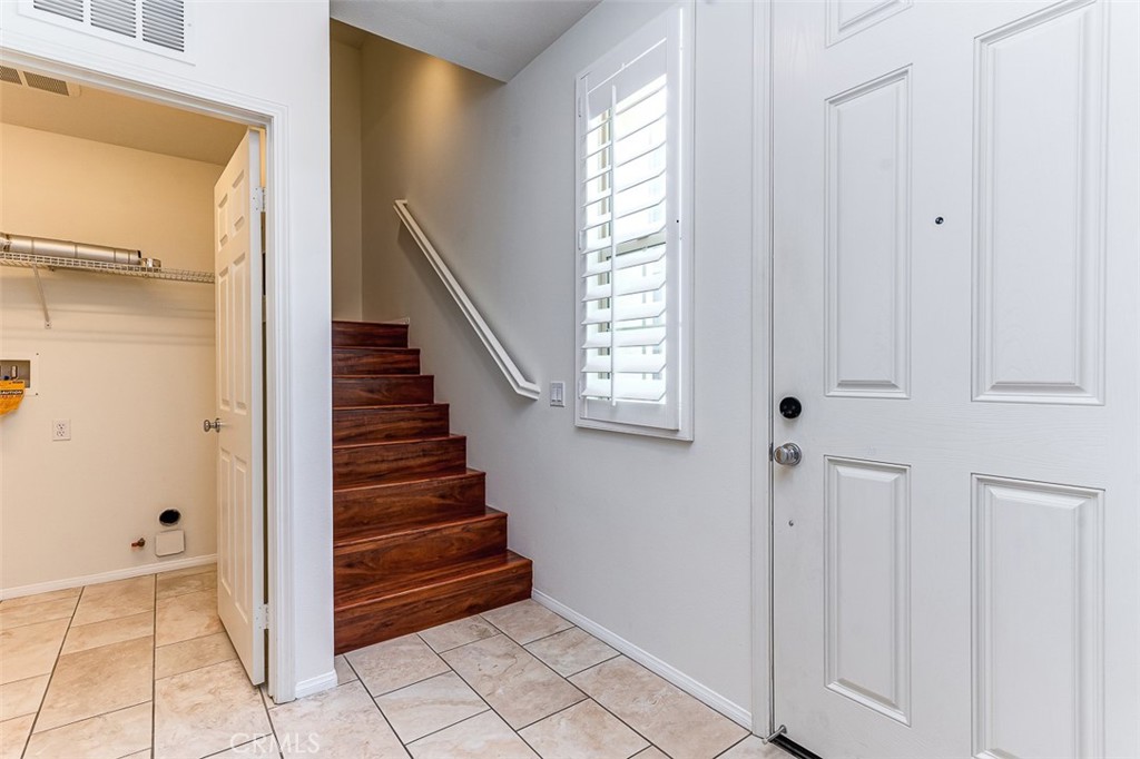 135 Silverado Irvine, CA 92618 - Photo 15 of 23 a view of an entryway with staircase